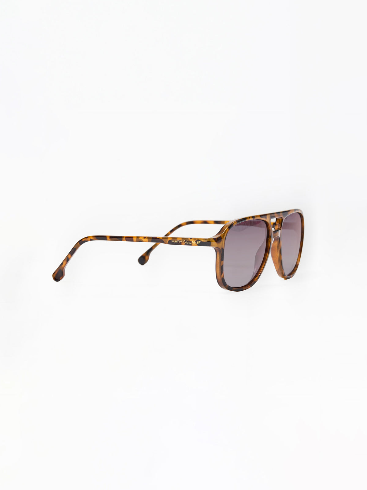 Sunglasses with tortoiseshell frame and dark lenses on a white background