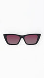 Black cat-eye sunglasses with red-tinted lenses on a white background