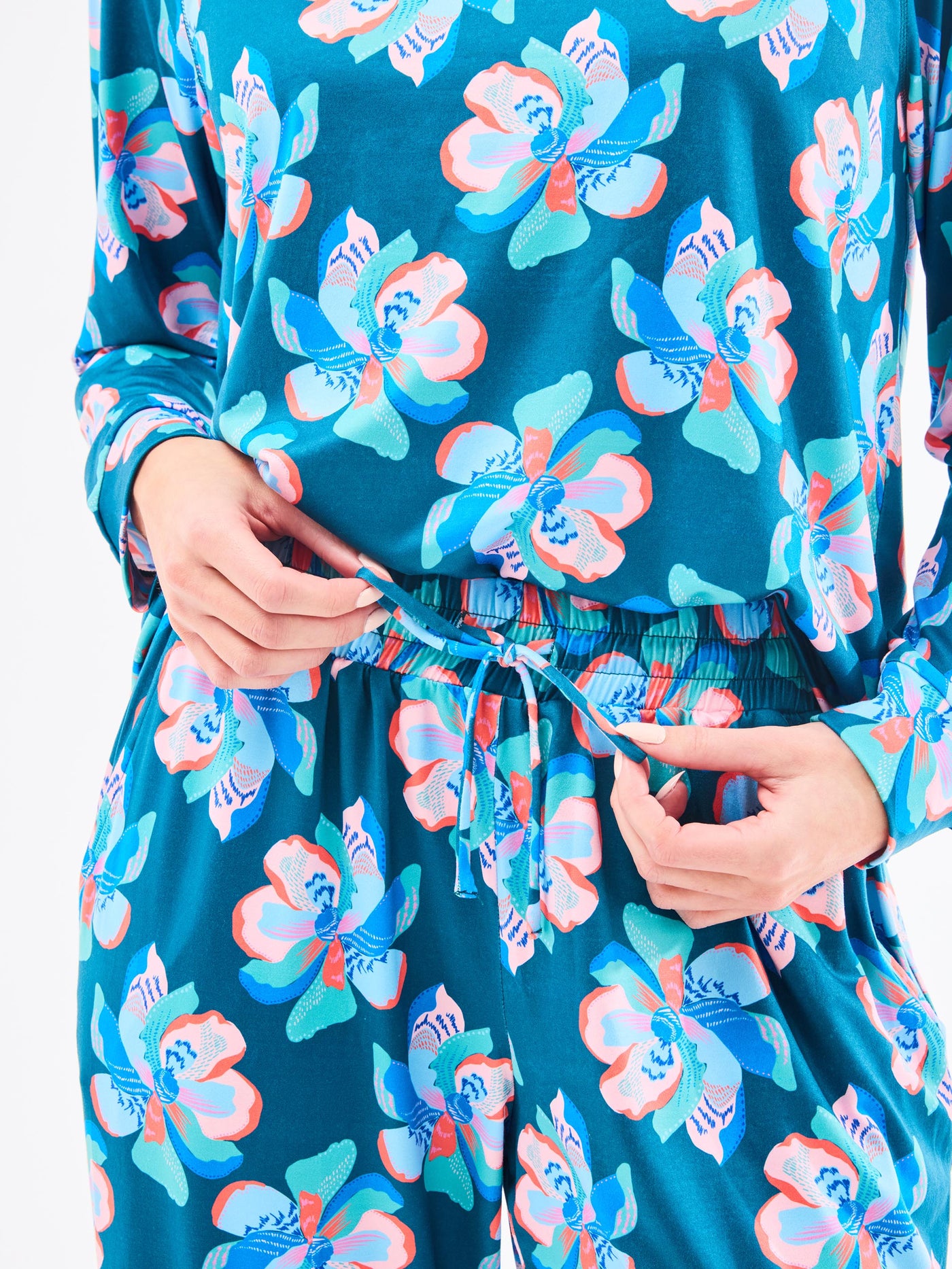 Floral patterned pajamas with a blue background
