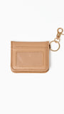 Beige cardholder with keychain on a white background