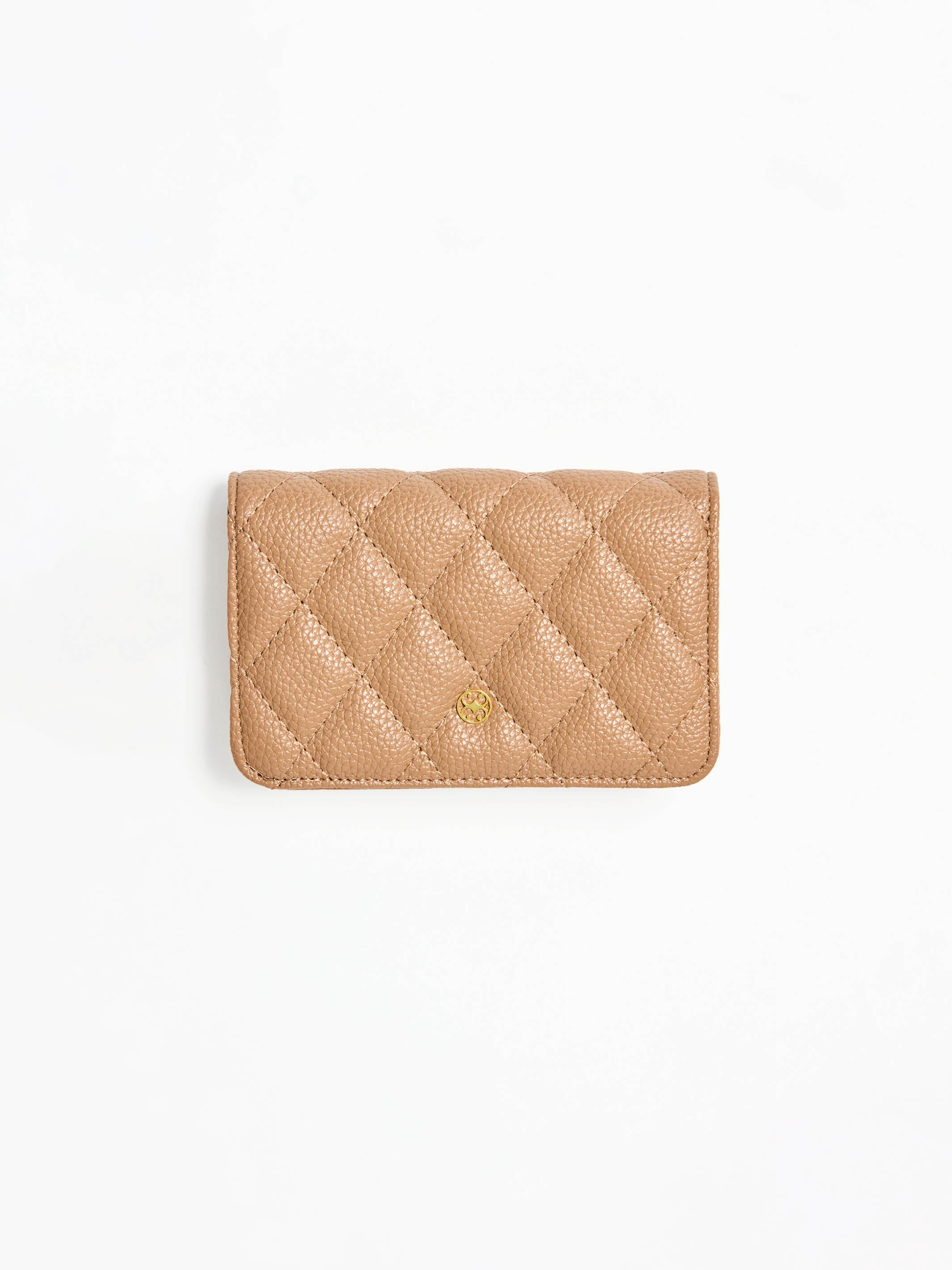 Quilted beige wallet on a white background