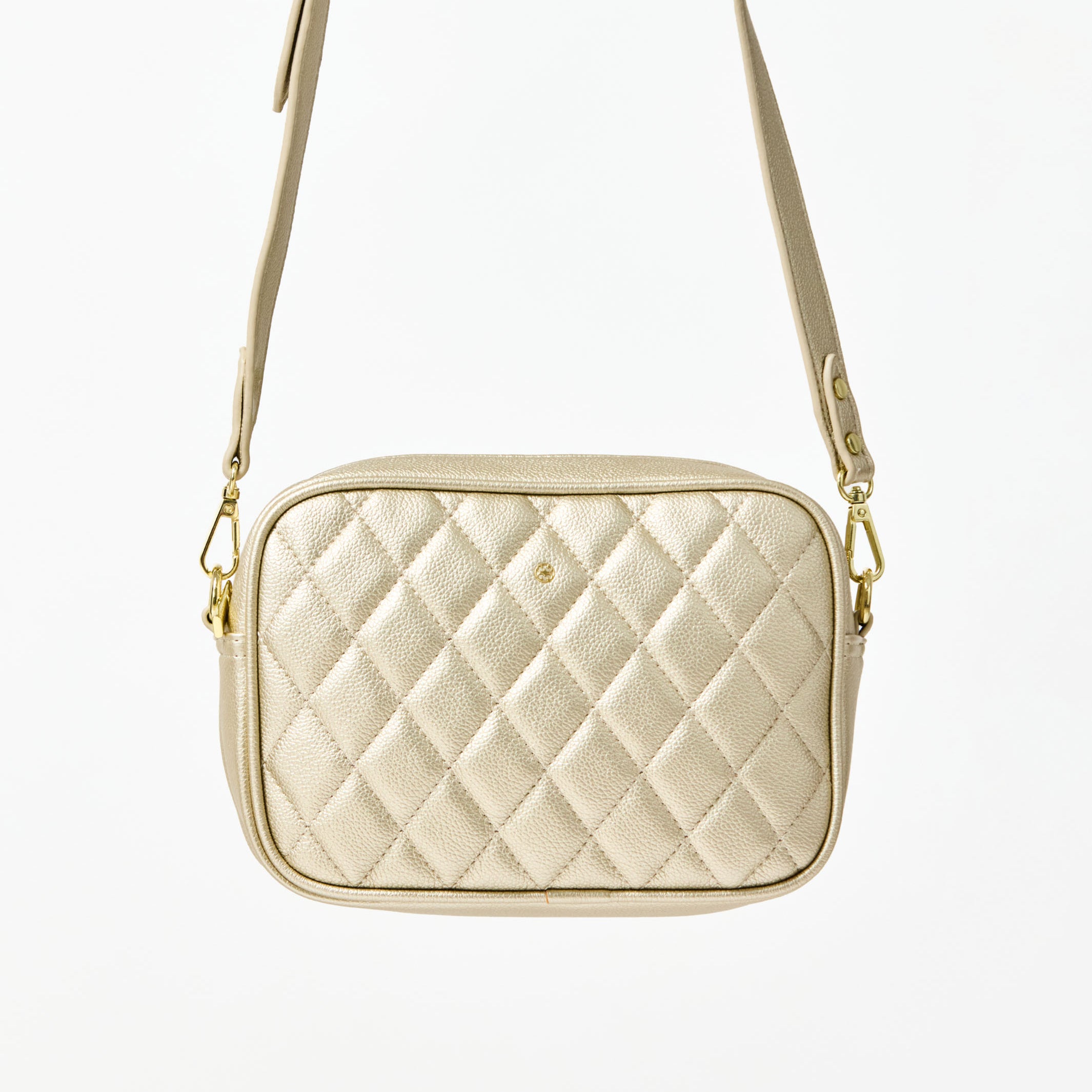 Quilted beige handbag with gold chain strap on a white background