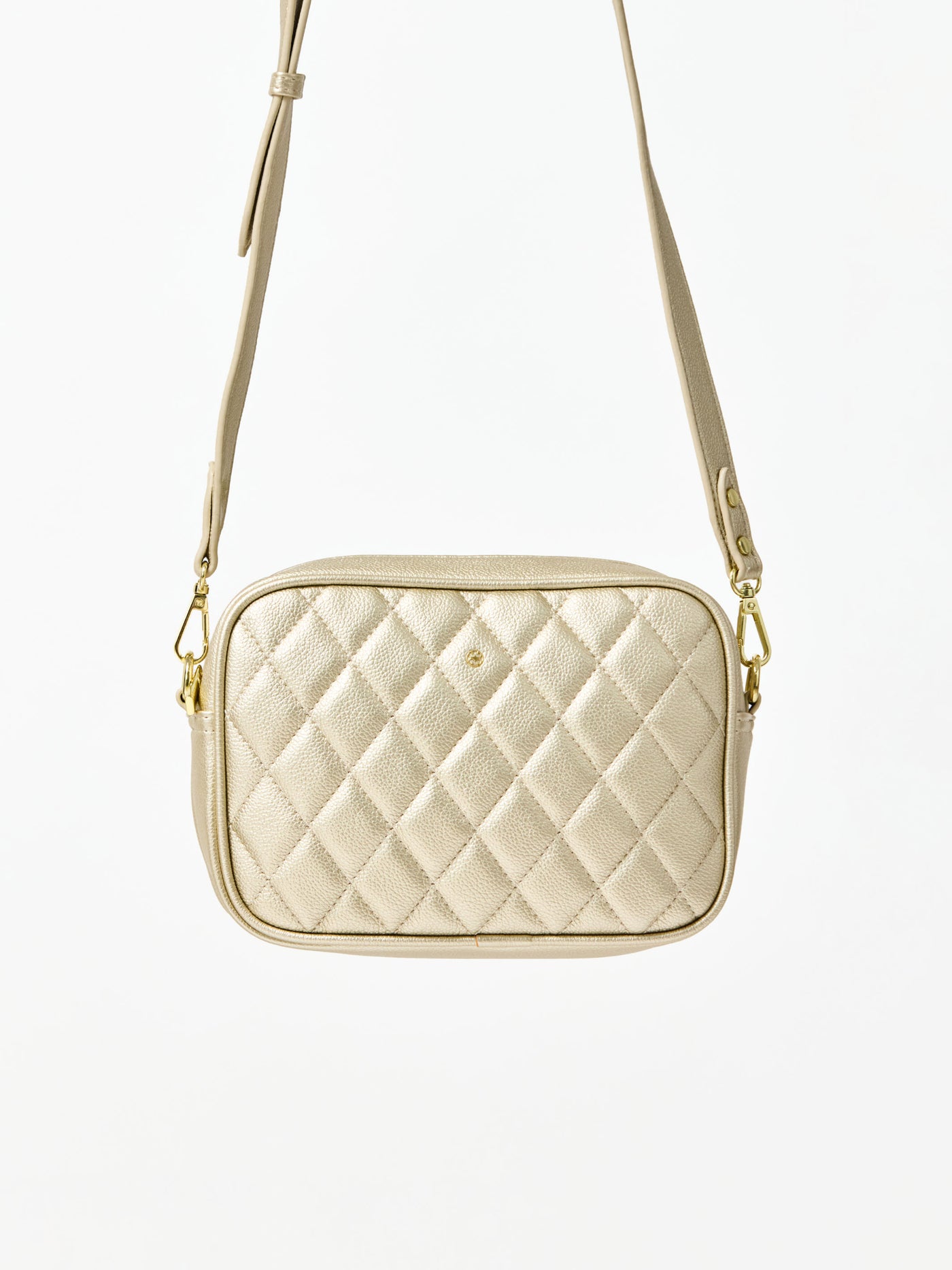 Quilted beige handbag with gold chain strap on a white background
