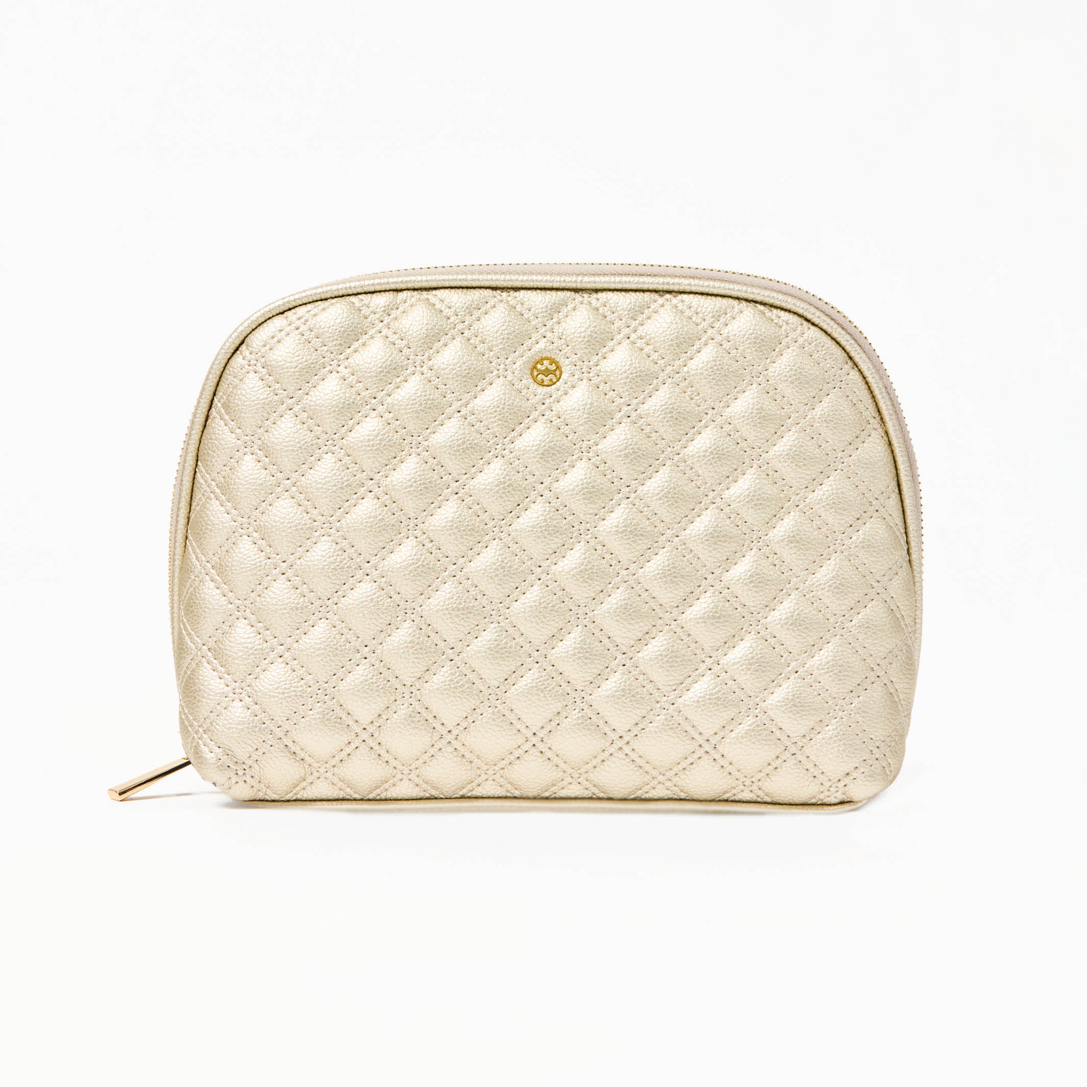 Quilted champagne colored cosmetic bag on a white background