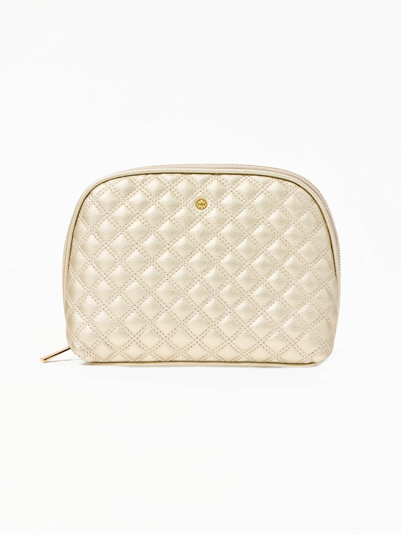 Quilted champagne colored cosmetic bag on a white background