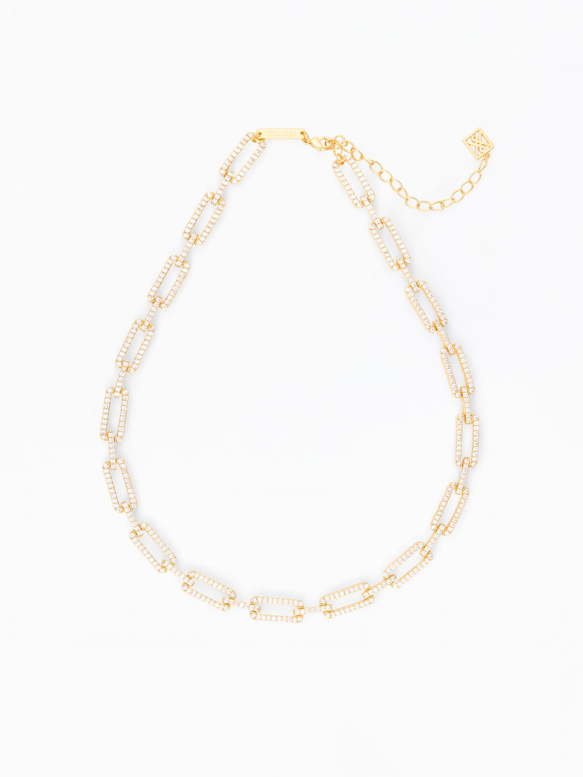 Gold necklace with rhinestone details on a white background