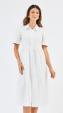 Woman wearing a white dress on a white background