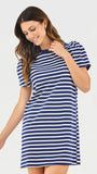 Woman wearing a blue and white striped dress on a plain background