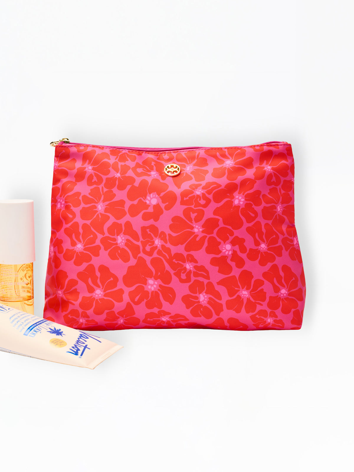 Pink floral pouch with a visible brand logo on a white background
