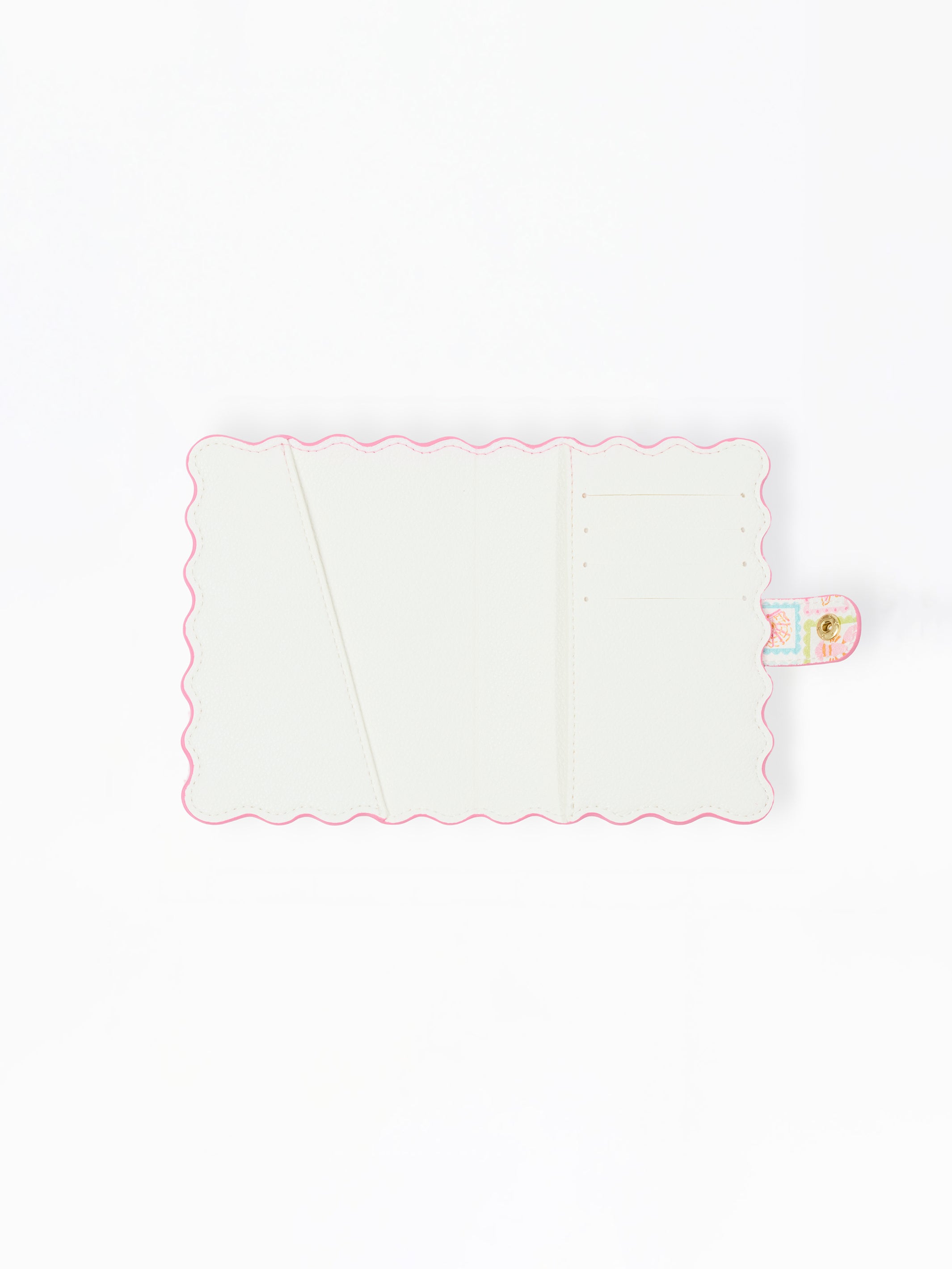 White interior passport cover with pink scalloped edge on a white background