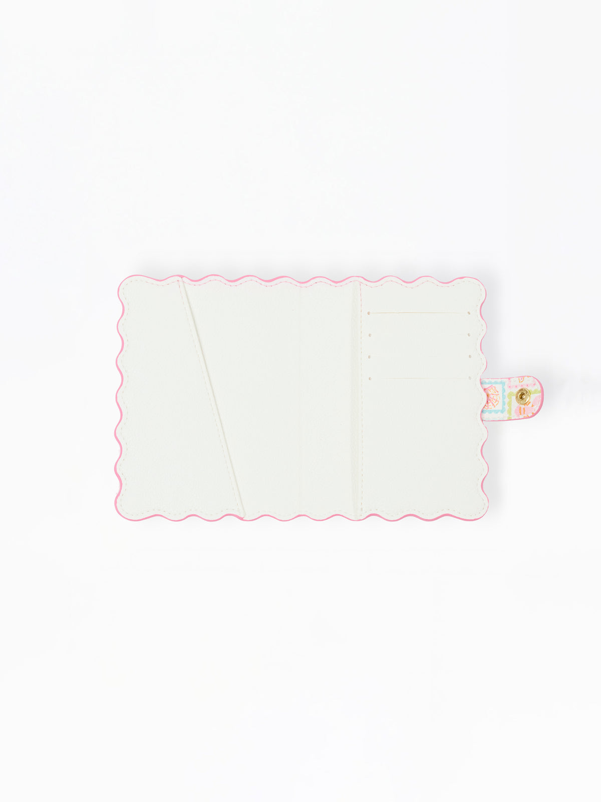 White interior passport cover with pink scalloped edge on a white background