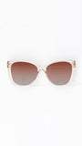 Sunglasses with a gradient brown lens on a white background