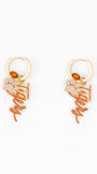 Pair of gold hoop earrings with 'Tigers' and orange rhinestone accents on a white background