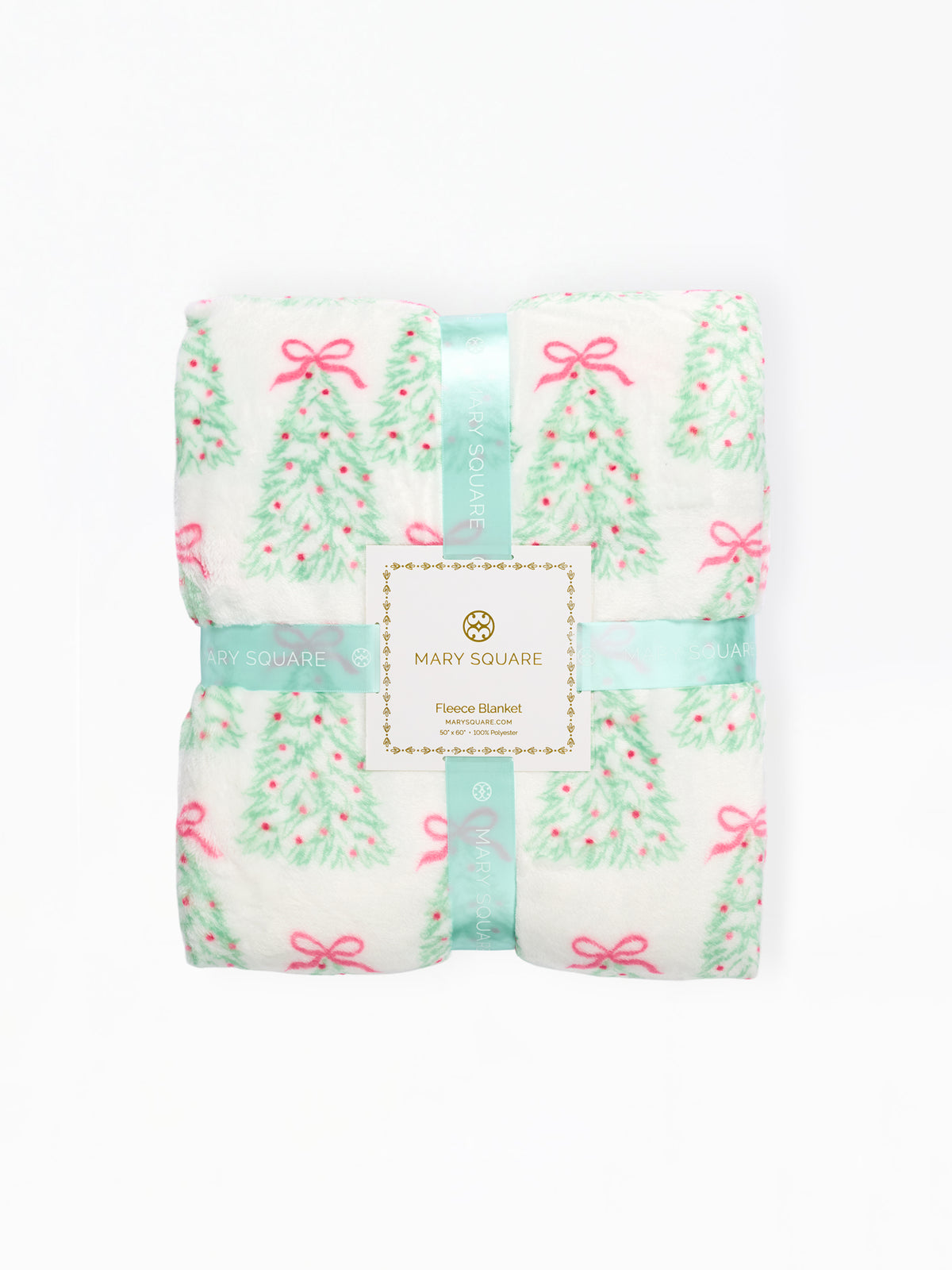 A folded Mary Square fleece blanket featuring a festive Christmas tree pattern with pink bows and ornaments on a white background, wrapped in a mint green ribbon with the brand label in the center.