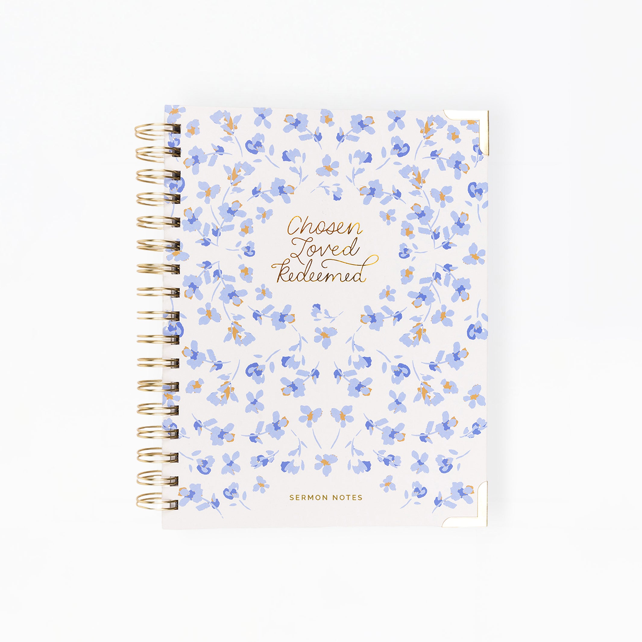 Notebook with floral design and text on a white background
