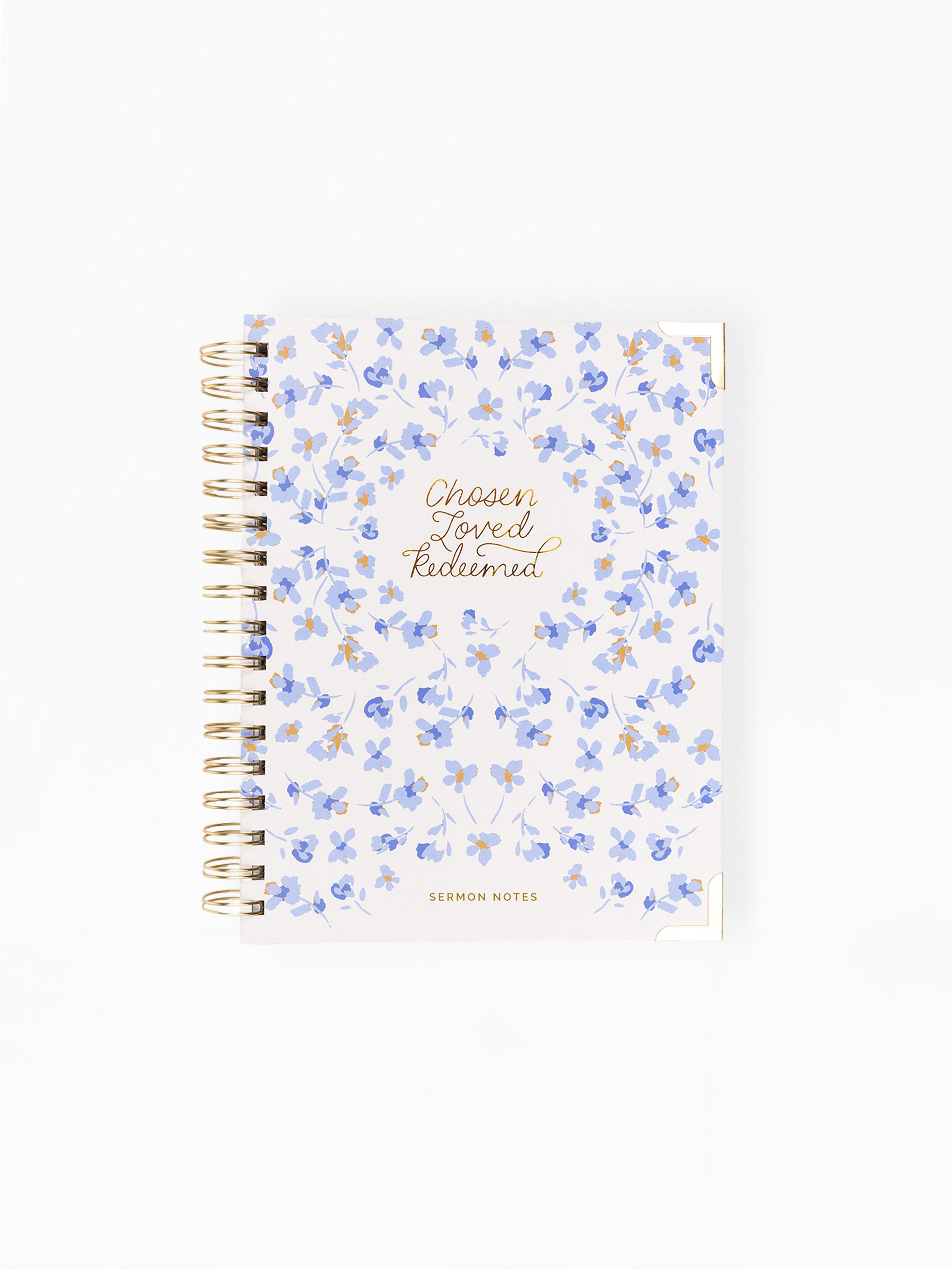 Notebook with floral design and text on a white background