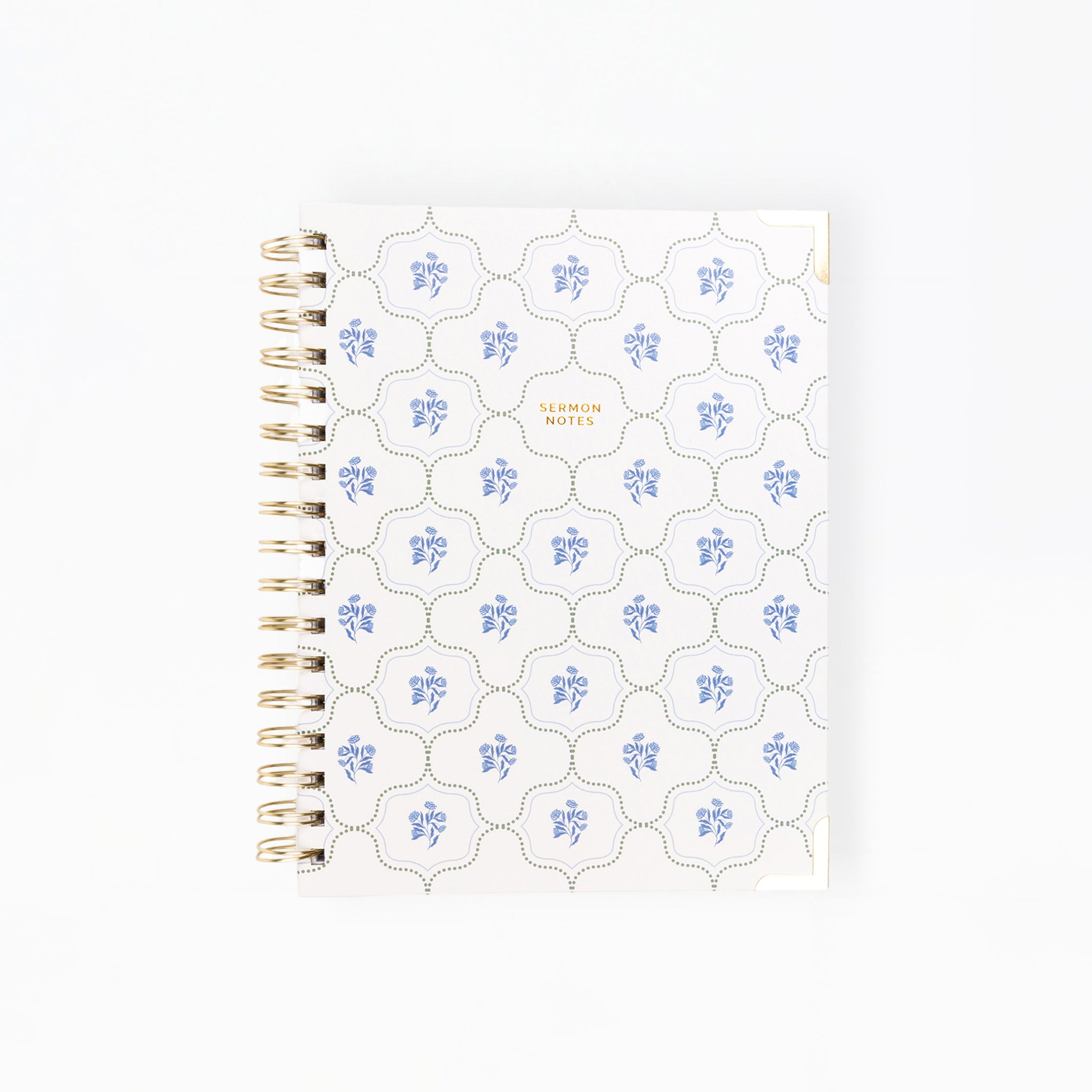 Notebook with floral pattern on white background