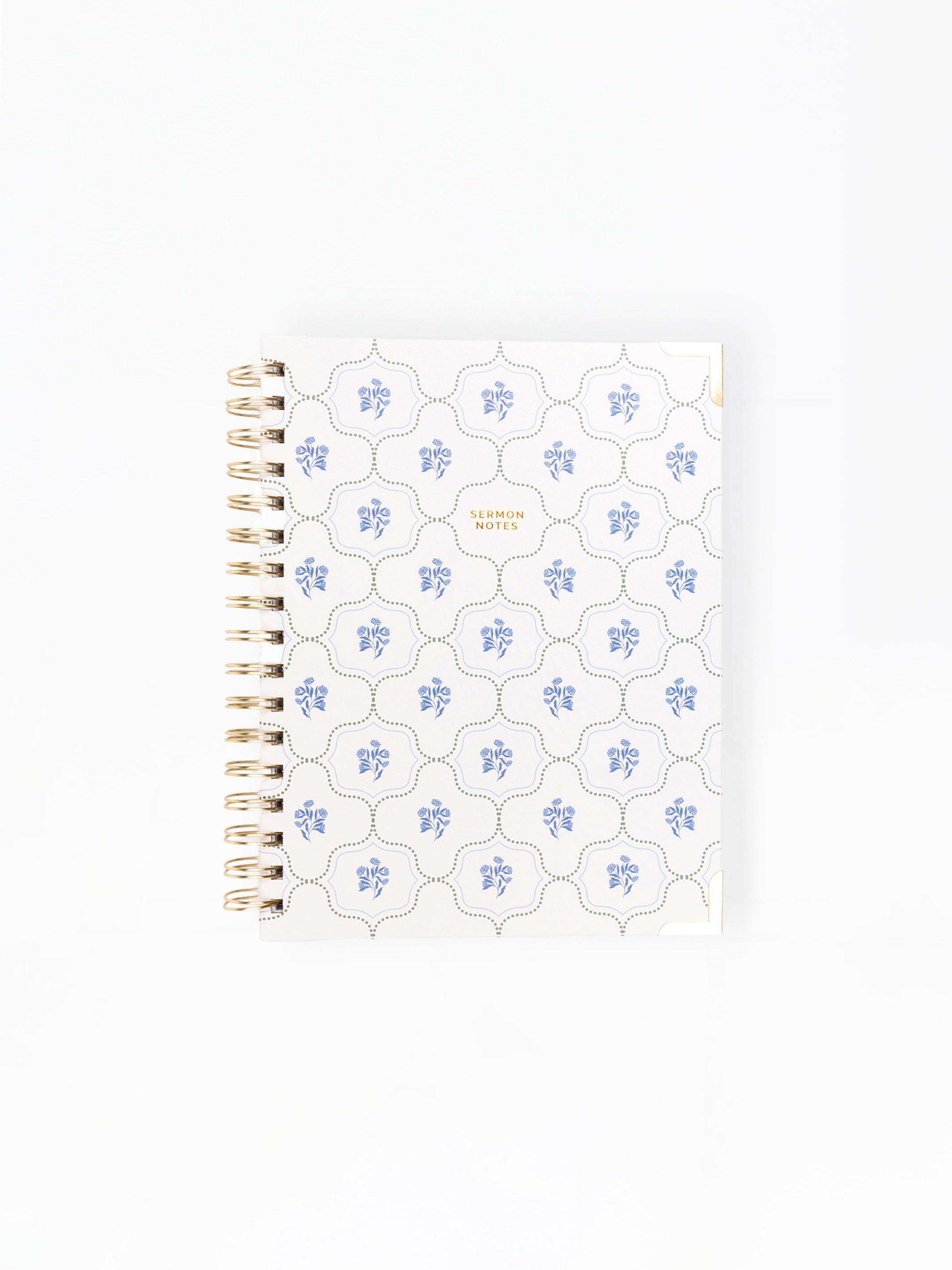 Notebook with floral pattern on white background
