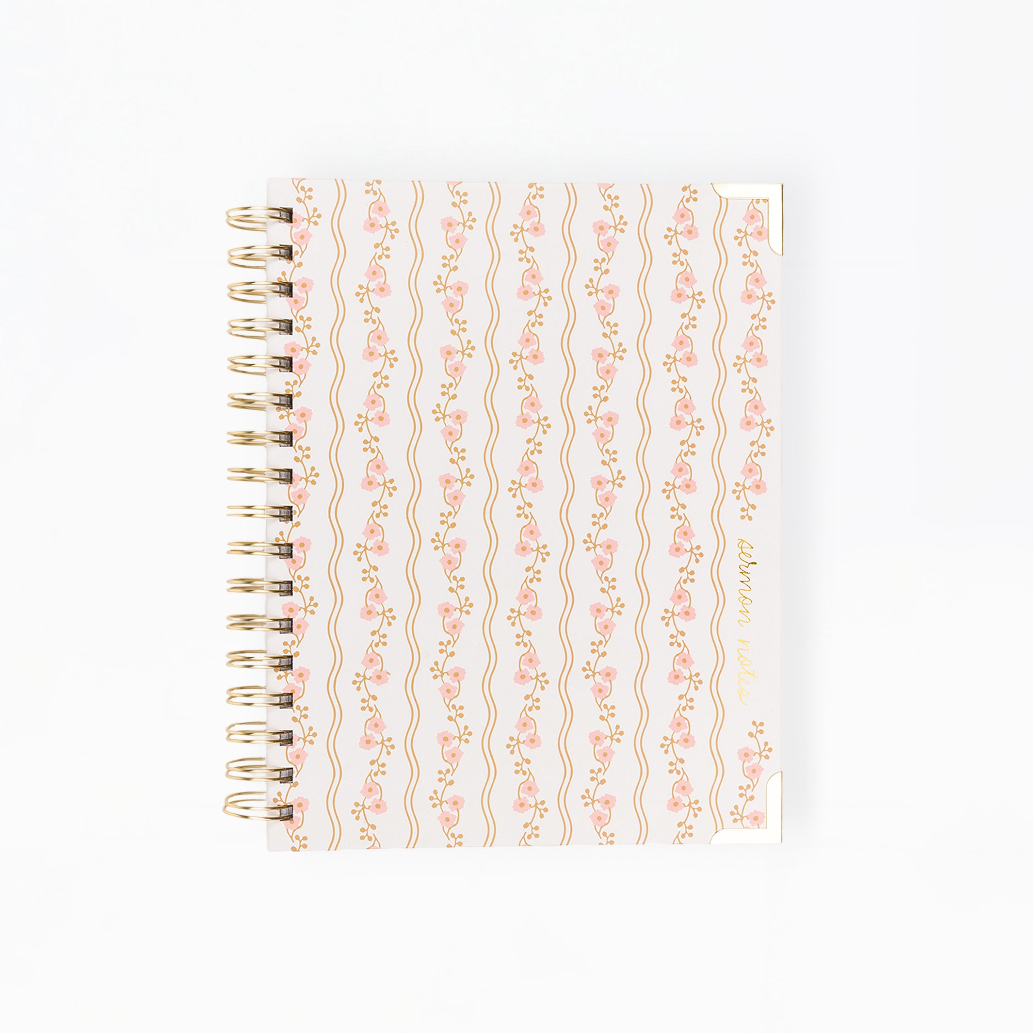 Notebook with decorative cover on a white background