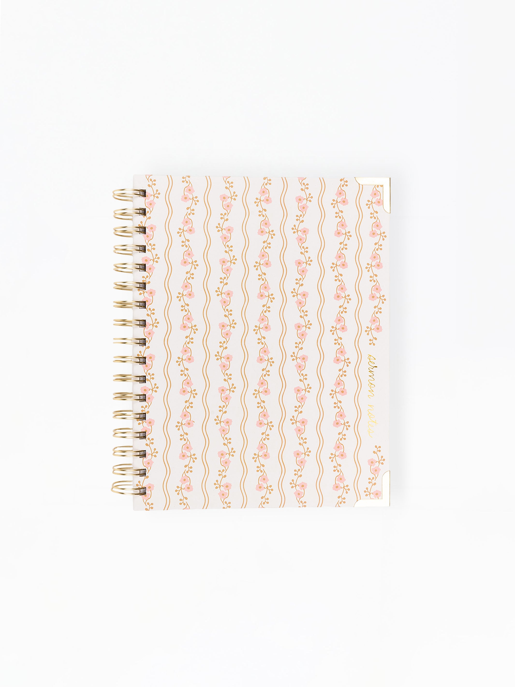 Notebook with decorative cover on a white background
