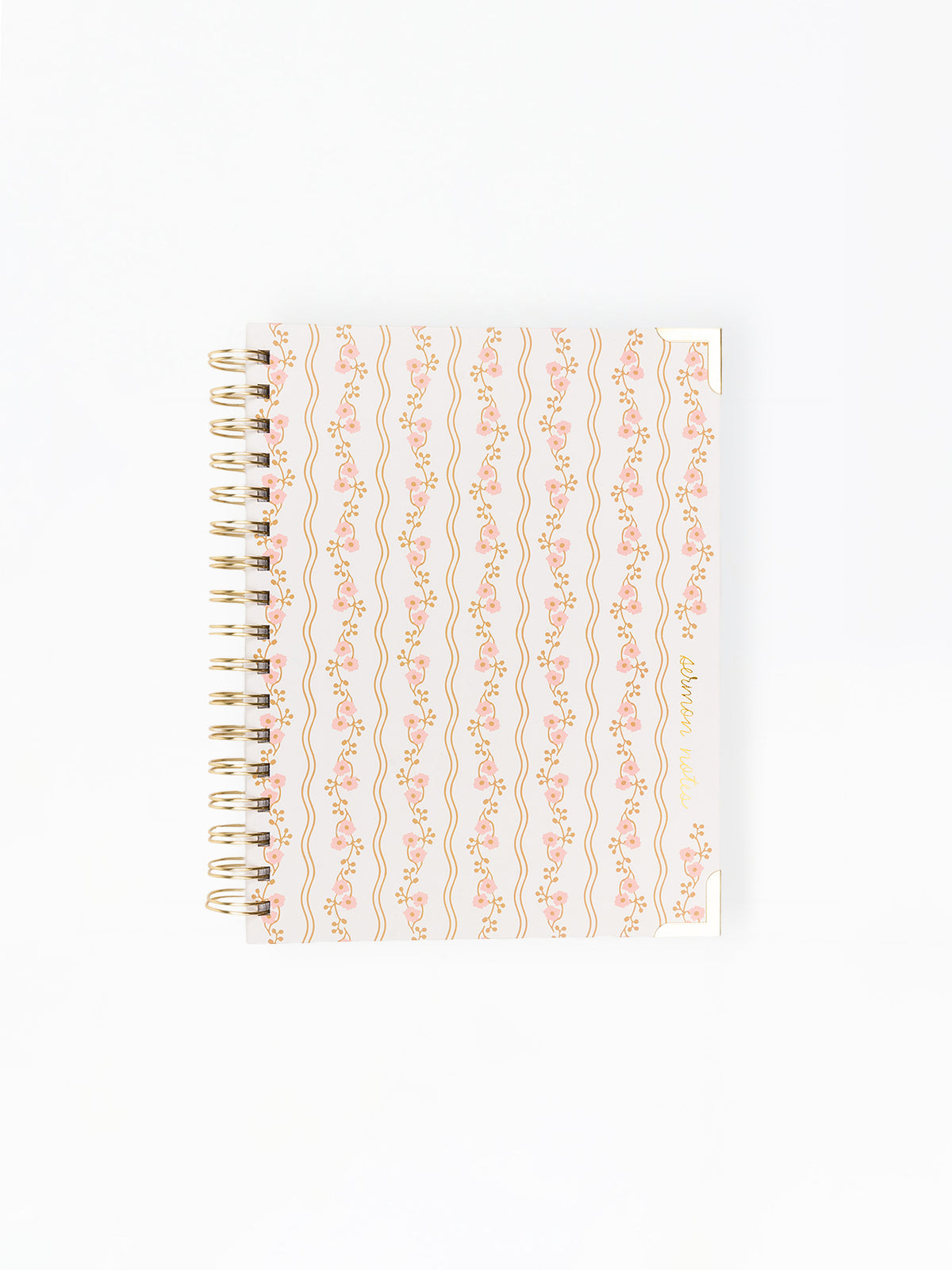 Notebook with decorative cover on a white background