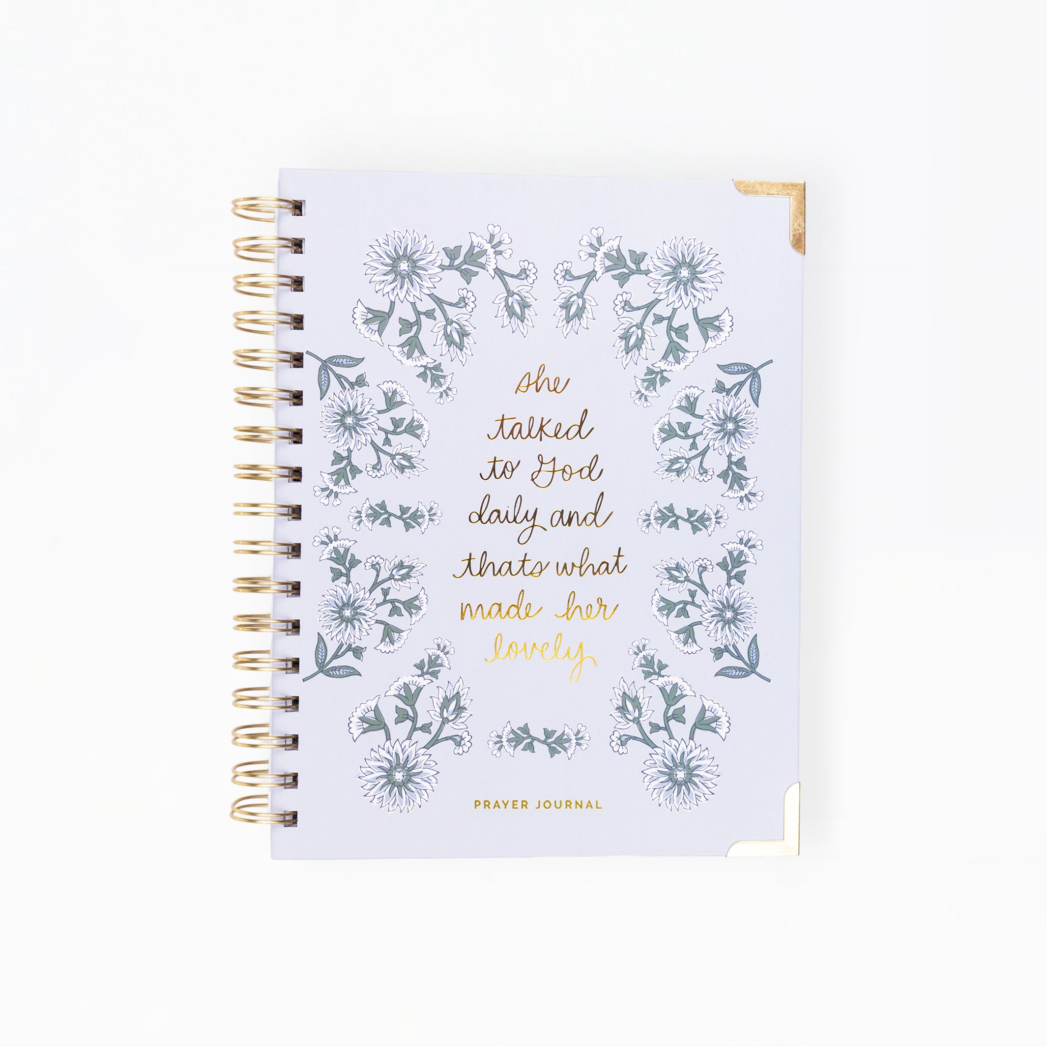 Notebook with floral design and text on a white background