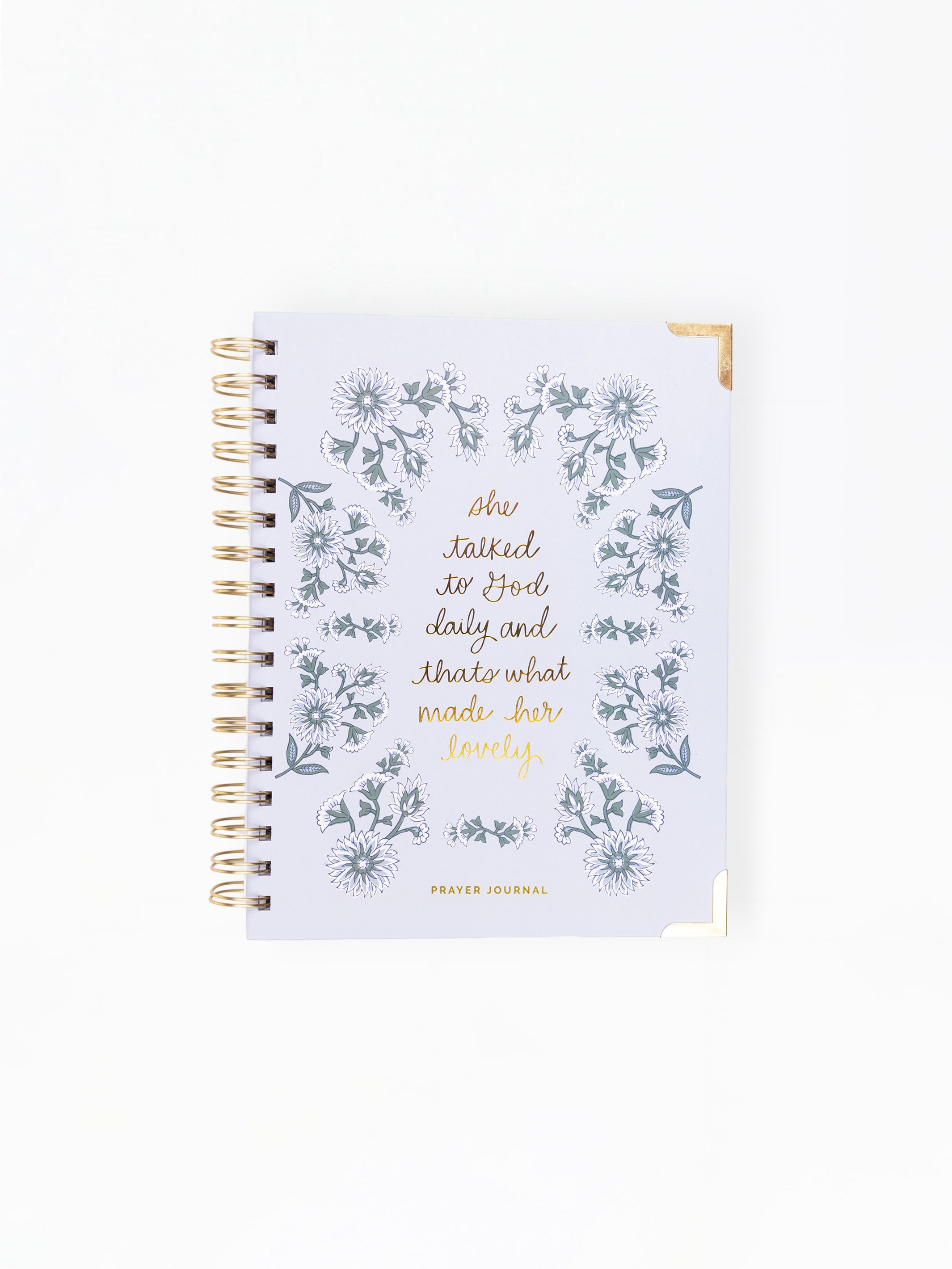 Notebook with floral design and text on a white background