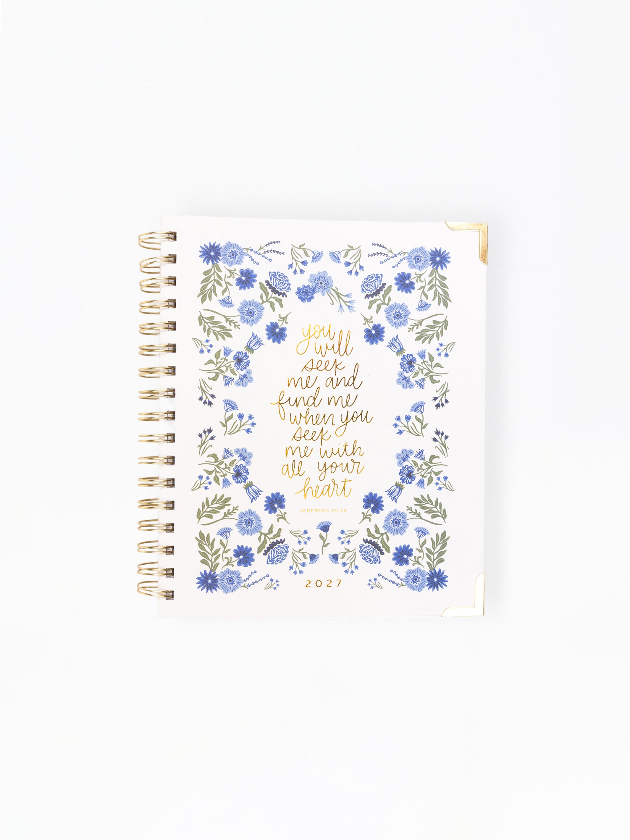 Planner with blue and green floral design and text on a white background