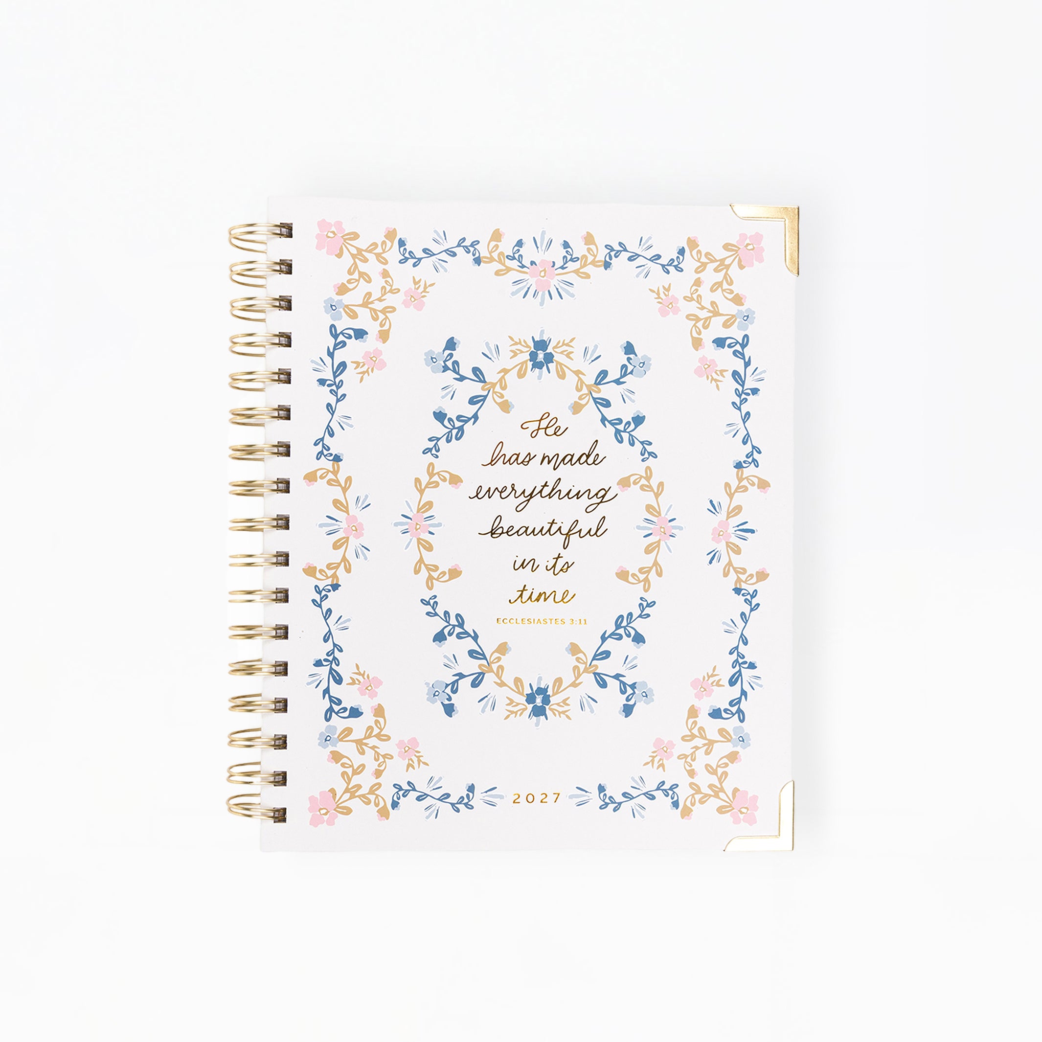 Notebook with floral design and text on a white background