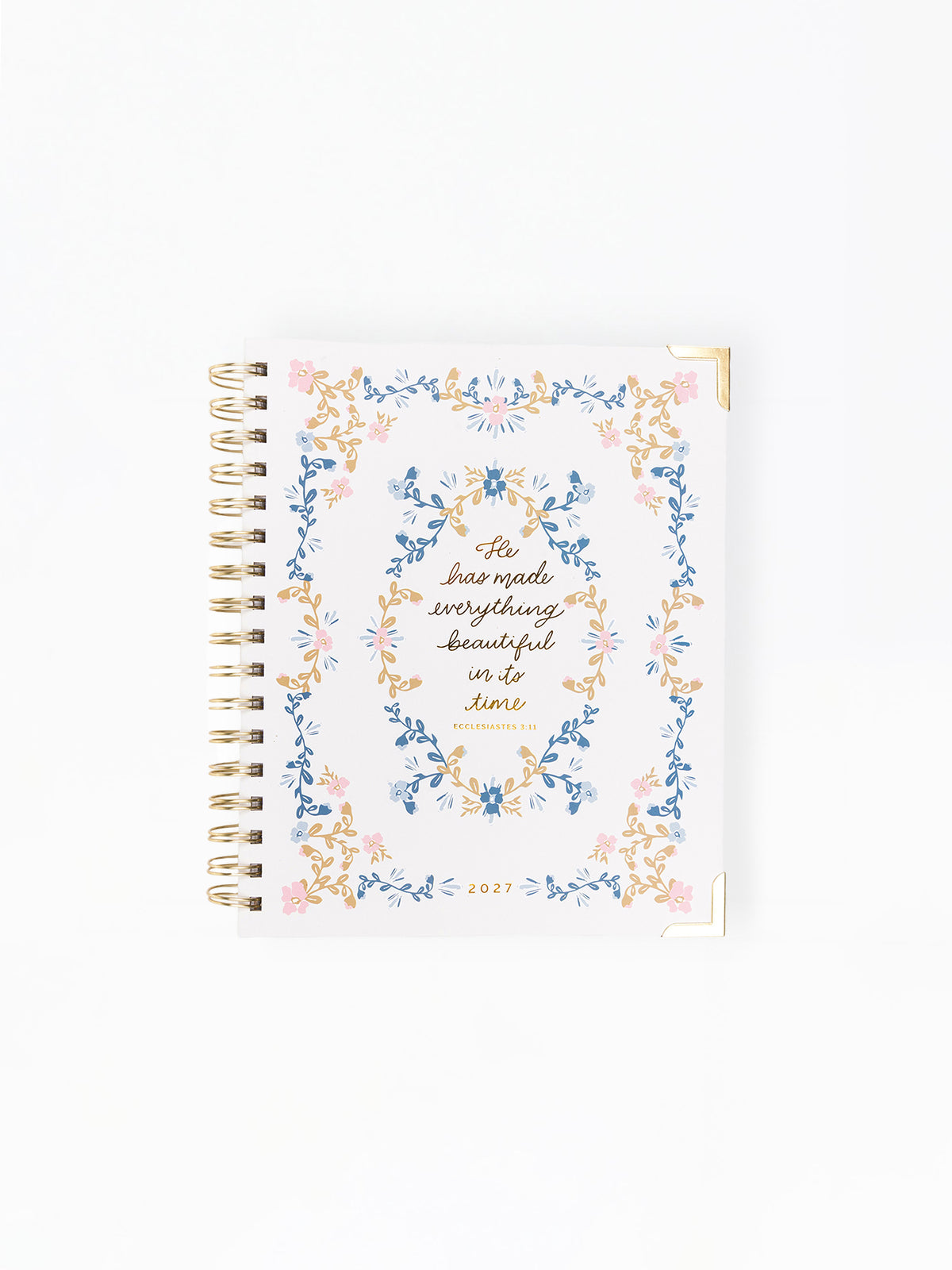 Notebook with floral design and text on a white background