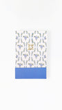 Notebook with floral design and 'to do list' text on a white background
