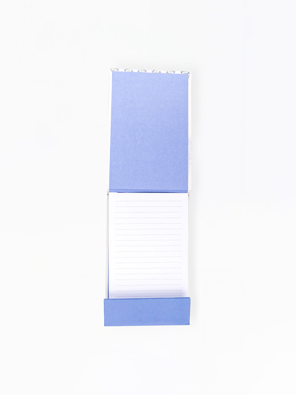 Open notepad with blue top and white bottom on a white background