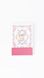 Notebook with floral design and 'Prayer List' text on a white background