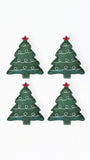 Four dark green Christmas tree-shaped items with white decorative swirls and red star toppers, arranged in a 2x2 grid on a plain white background.