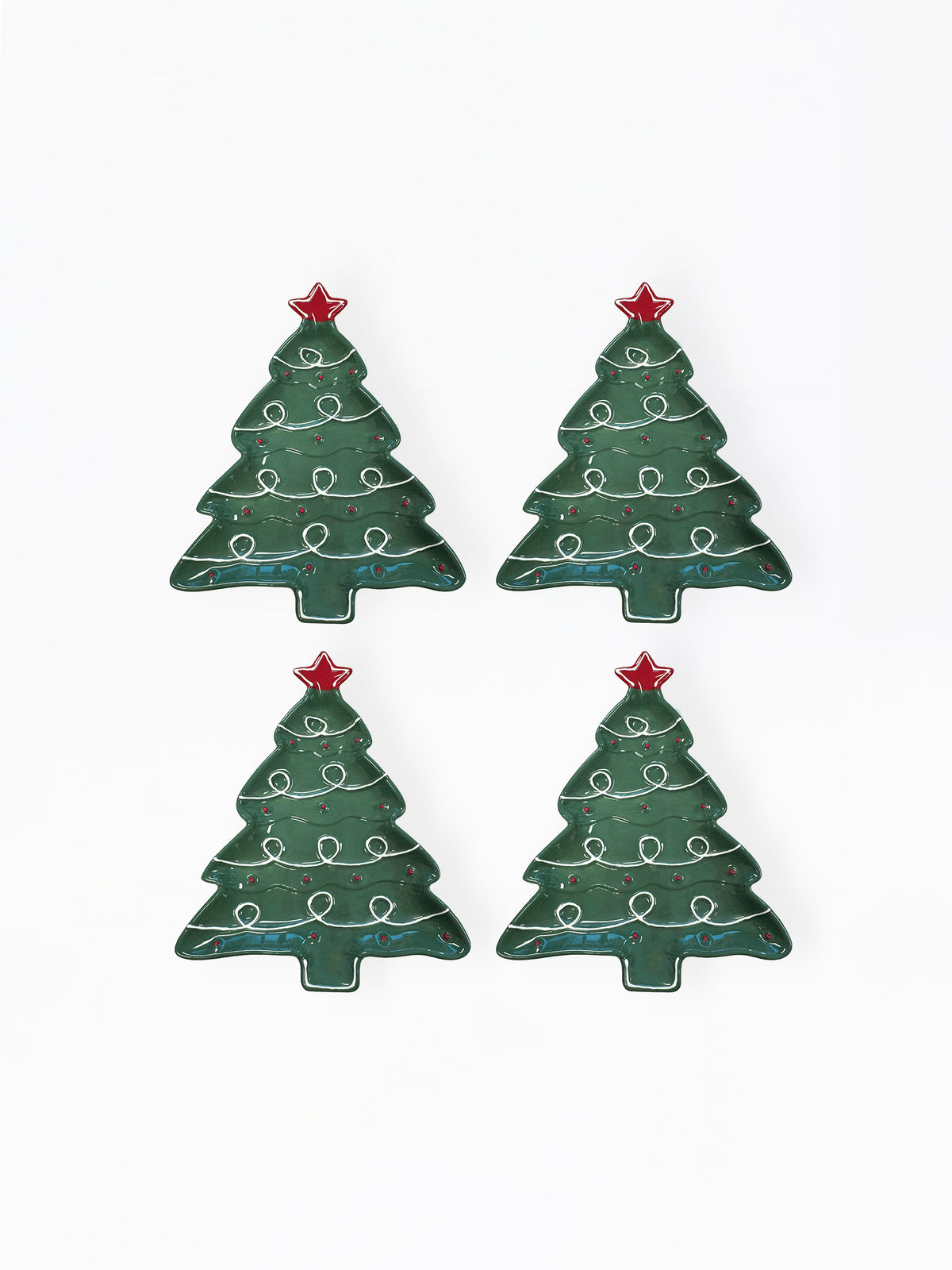 Four dark green Christmas tree-shaped items with white decorative swirls and red star toppers, arranged in a 2x2 grid on a plain white background.
