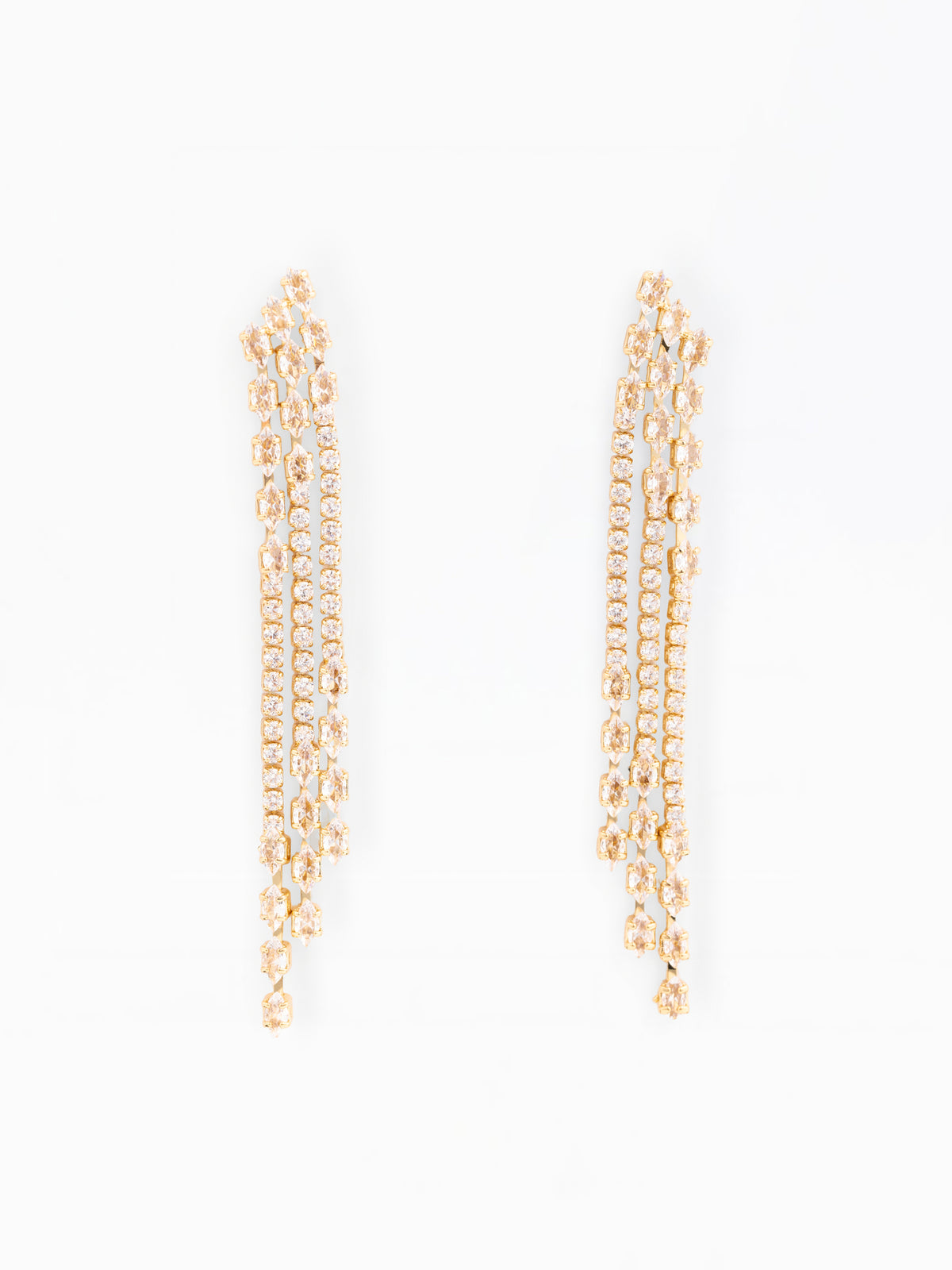 Gold chain earrings on a white background
