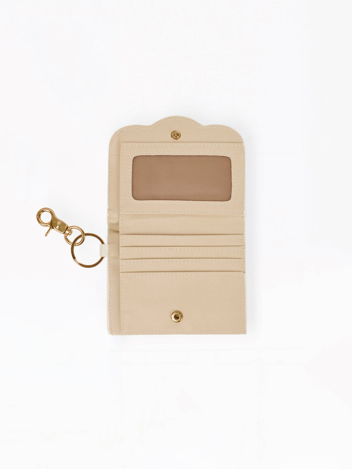 A beige leather card holder wallet with a gold-tone key ring and clasp, featuring a clear ID window on the front, shown on a plain white background.