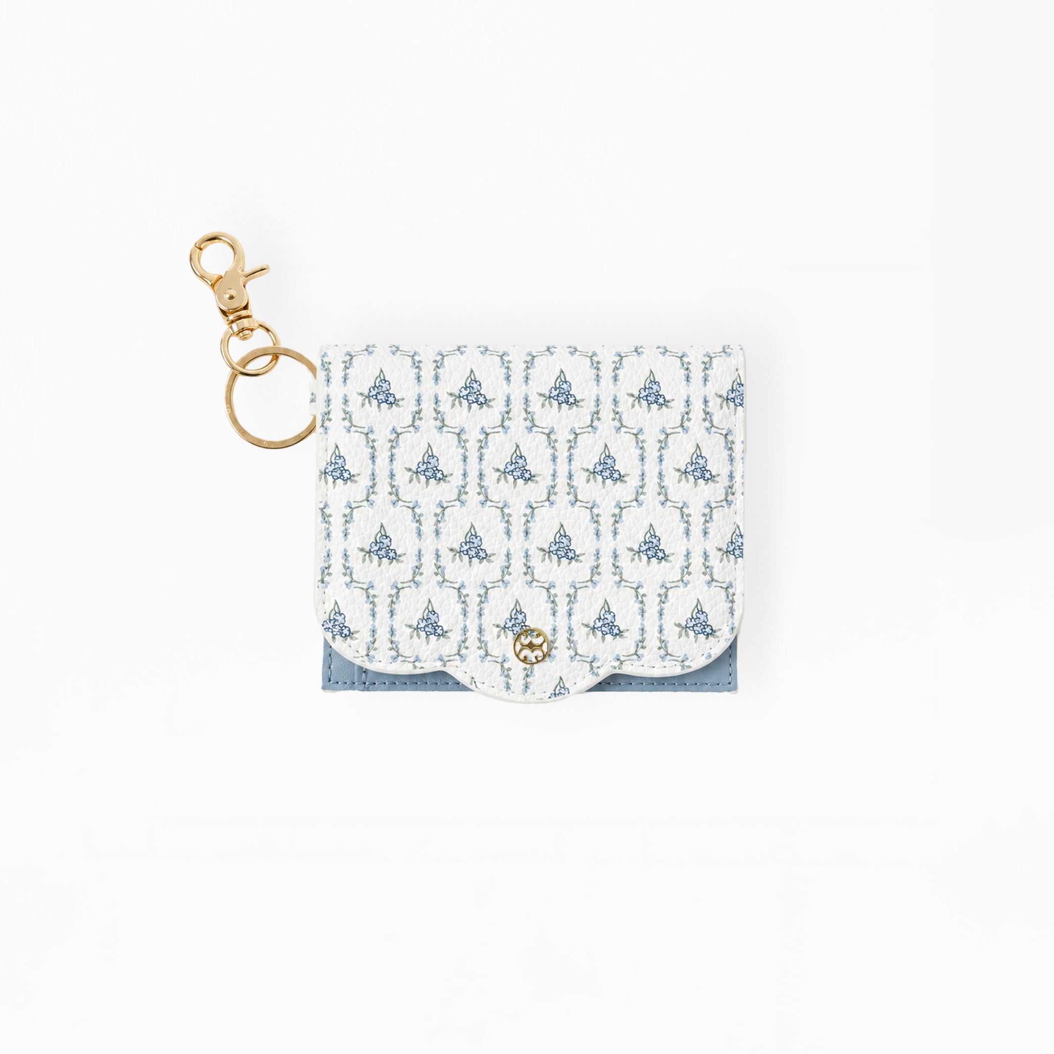 A small white card holder or pouch with a blue damask pattern, featuring a gold-tone metal clasp and key ring attachment, set against a plain white background.