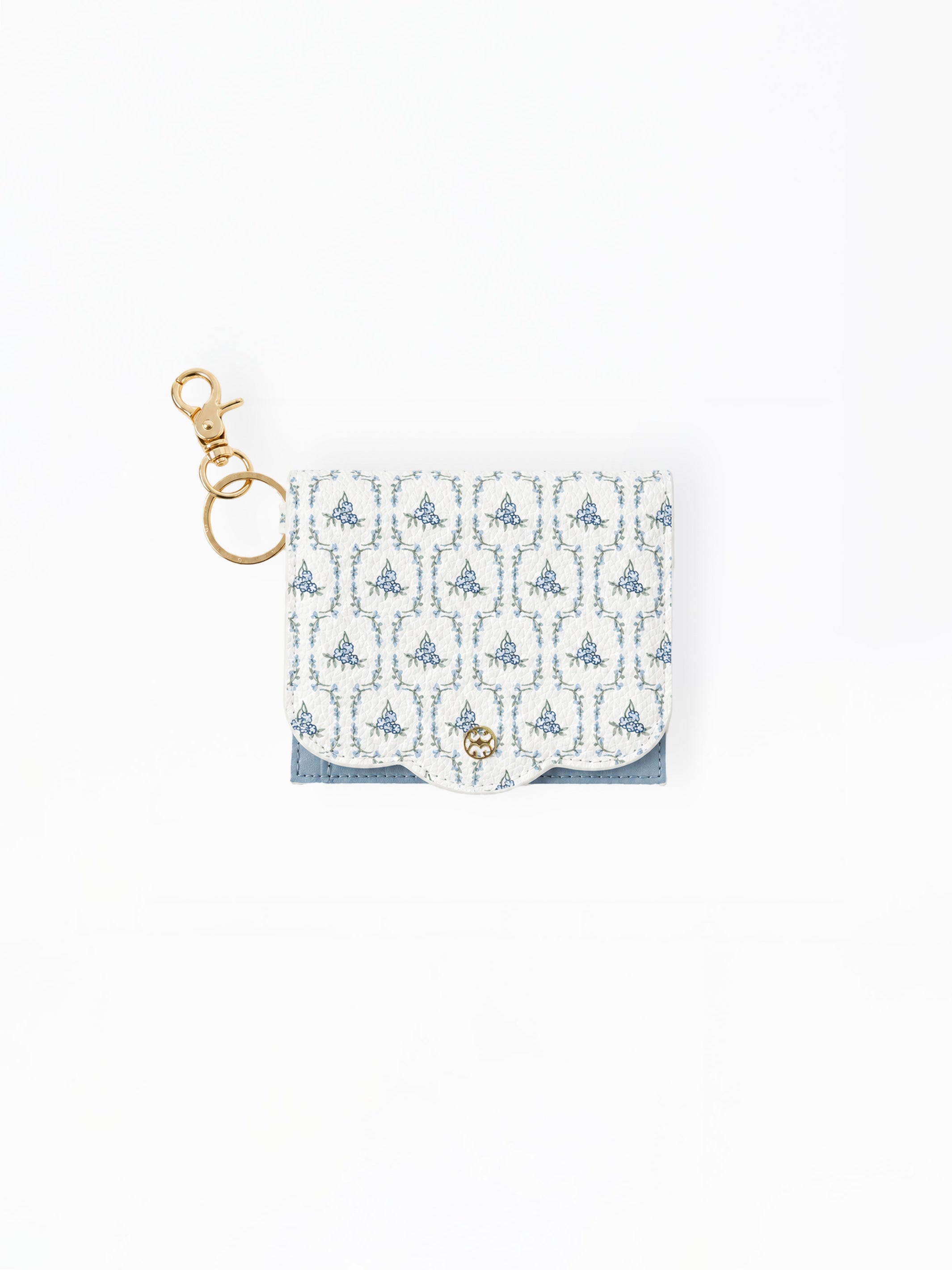 A small white card holder or pouch with a blue damask pattern, featuring a gold-tone metal clasp and key ring attachment, set against a plain white background.