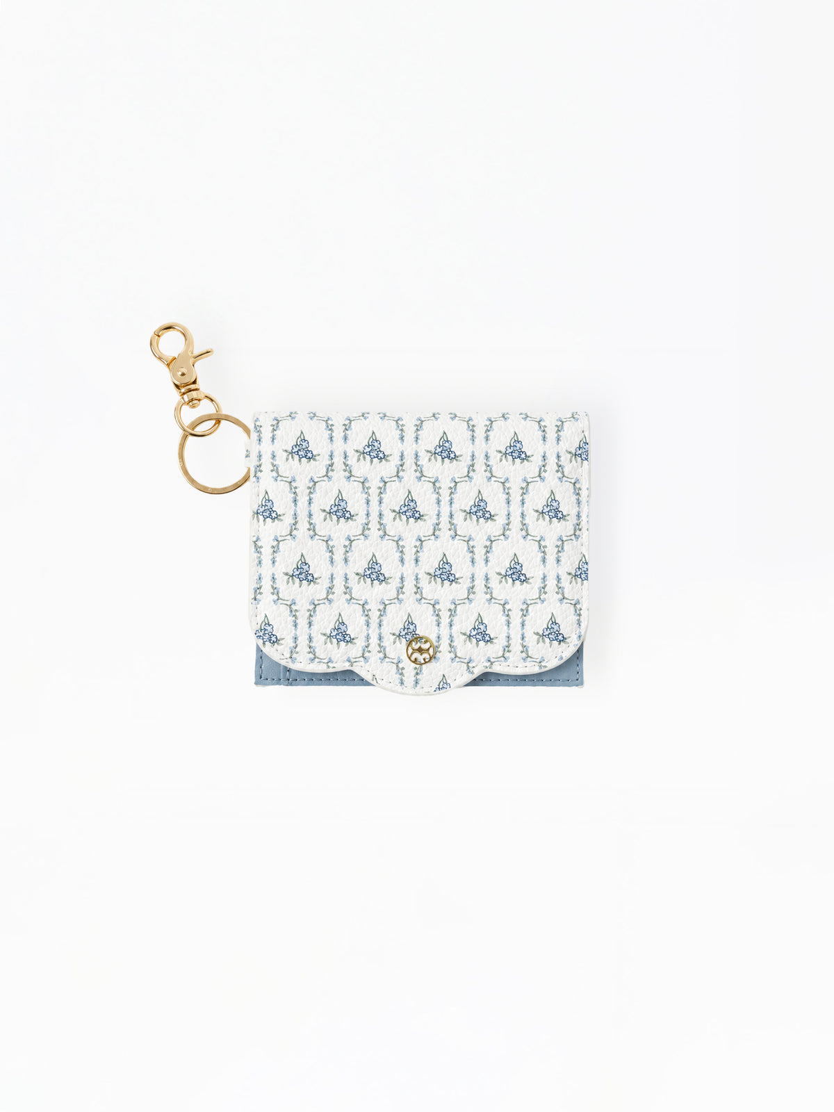 A small white card holder or pouch with a blue damask pattern, featuring a gold-tone metal clasp and key ring attachment, set against a plain white background.