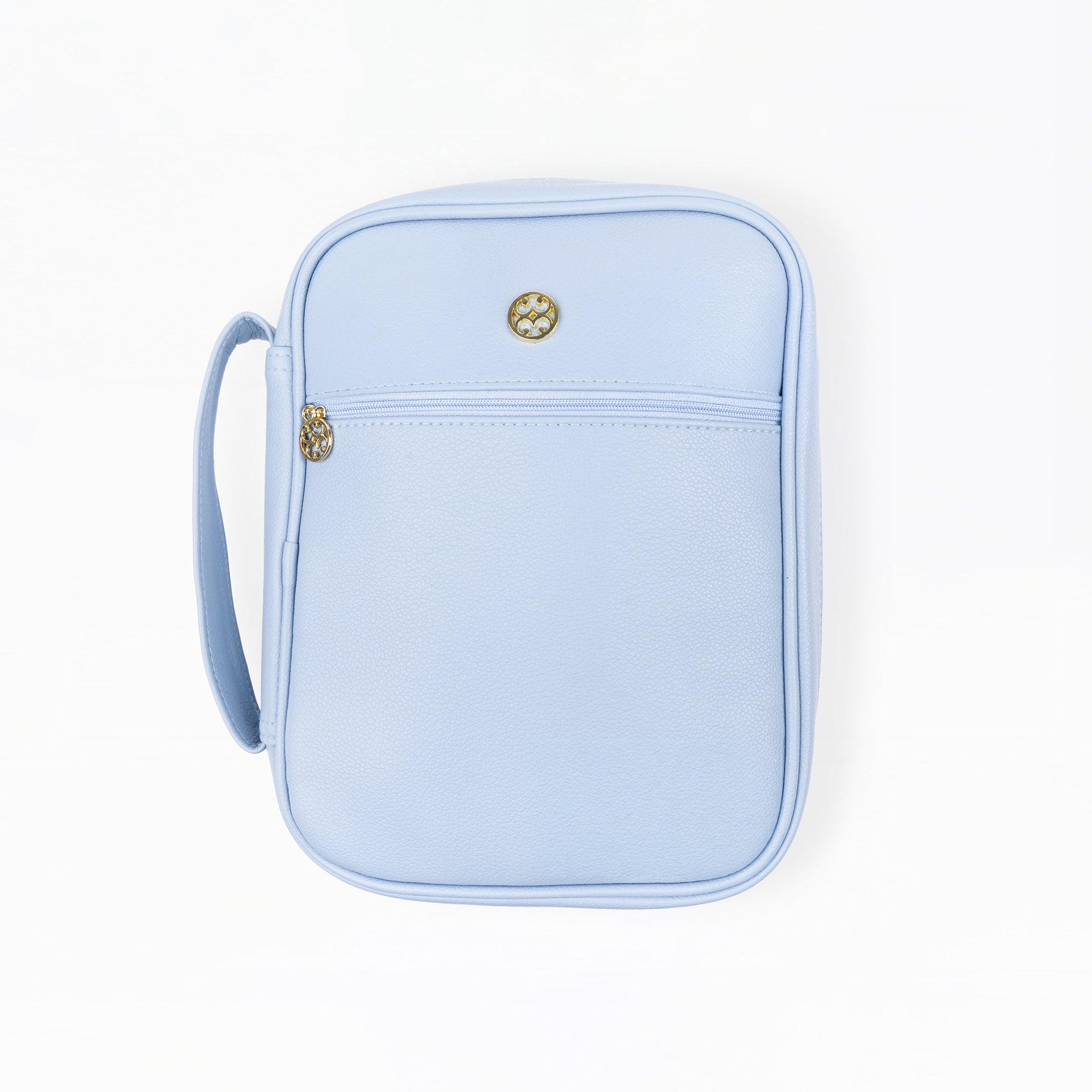 A light blue faux-leather bible cover with a front zippered pocket and a small gold-tone logo charm, shown on a plain white background.