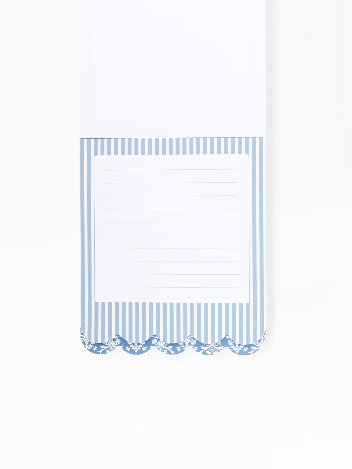 A white lined notepad with a blue and white striped border and a scalloped decorative edge, shown on a plain white background.