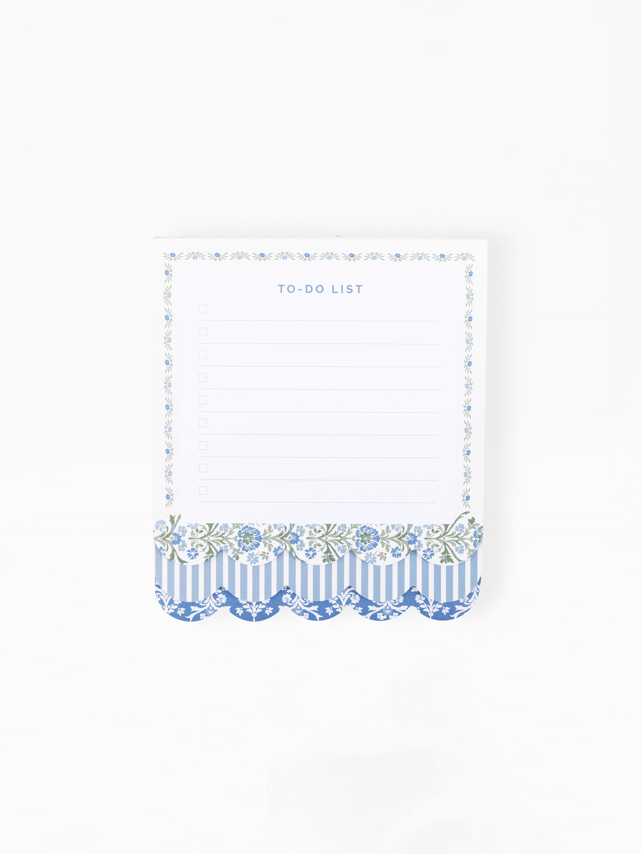 A small white to-do list notepad with a blue and white patterned border and scalloped bottom, shown on a plain white background.