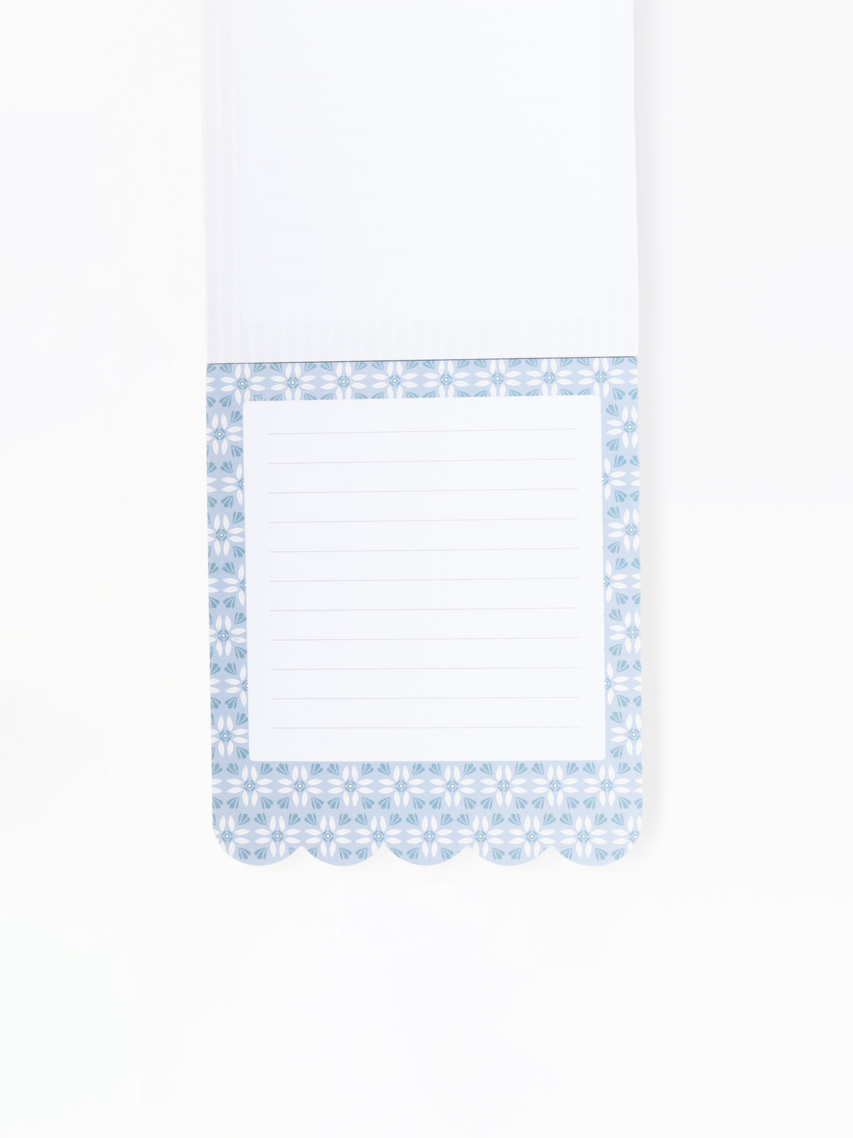A white lined notepad with a decorative light blue patterned border and scalloped bottom edge, shown on a plain white background.