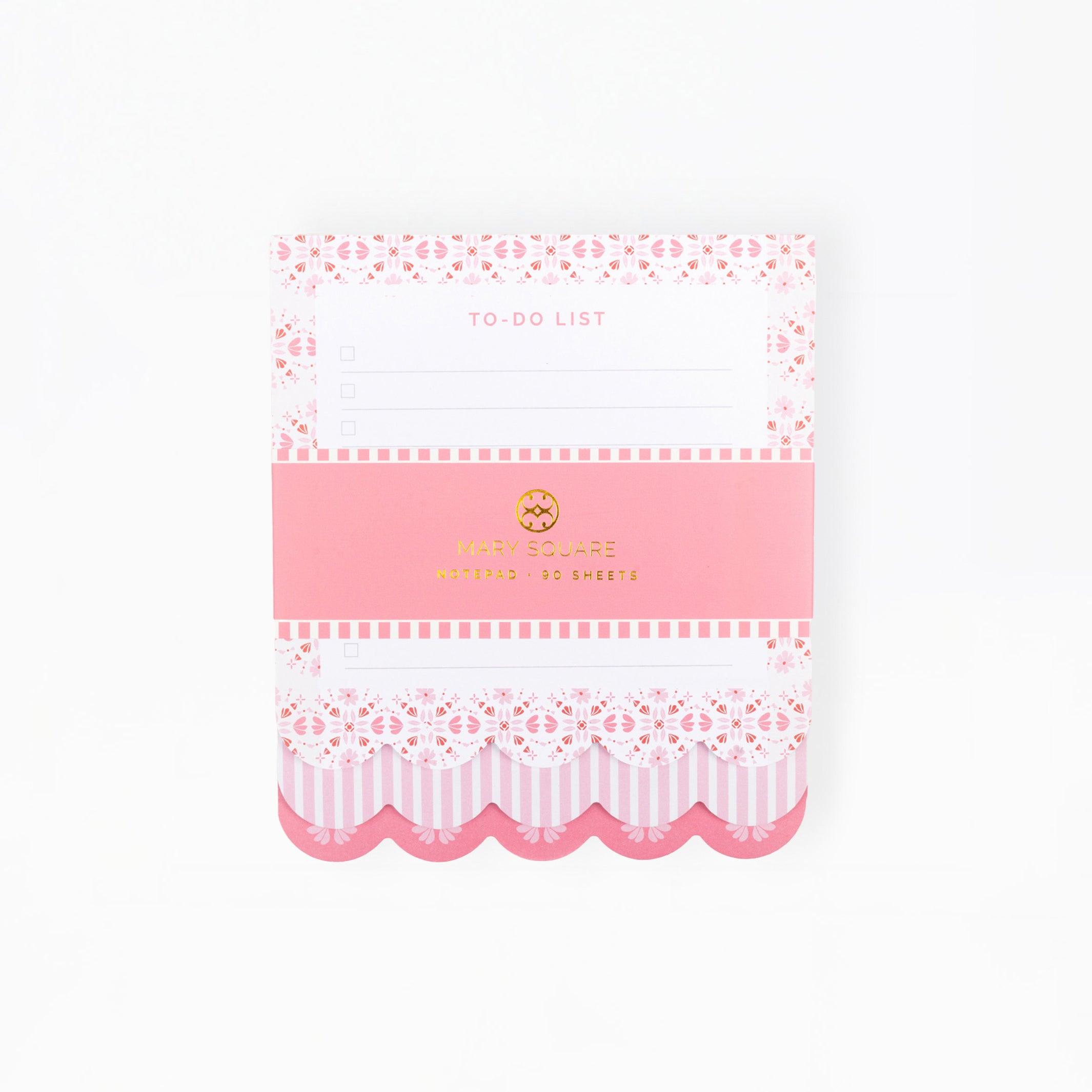 A pink and white to-do list notepad with decorative lace and striped borders, a pink center band with gold foil lettering, and a scalloped bottom edge, photographed on a clean white background.