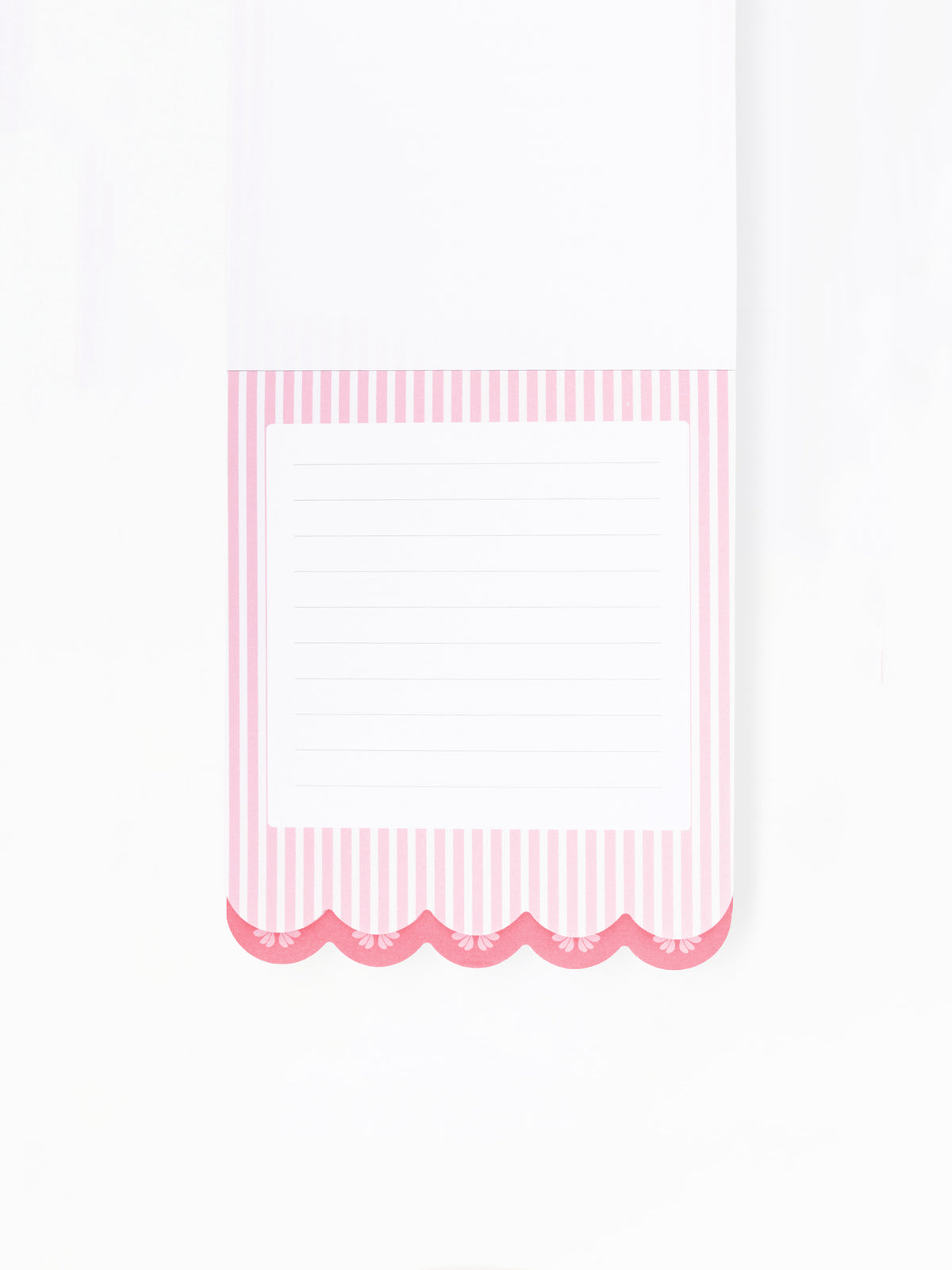 A close-up of a lined notepad page with a pink and white striped border and scalloped bottom edge on a white background.