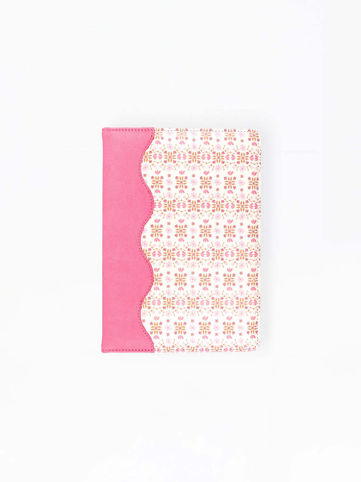 A notebook or journal with a bright pink cover on the left side and a white cover on the right featuring a delicate pink geometric pattern, separated by a scalloped pink border.