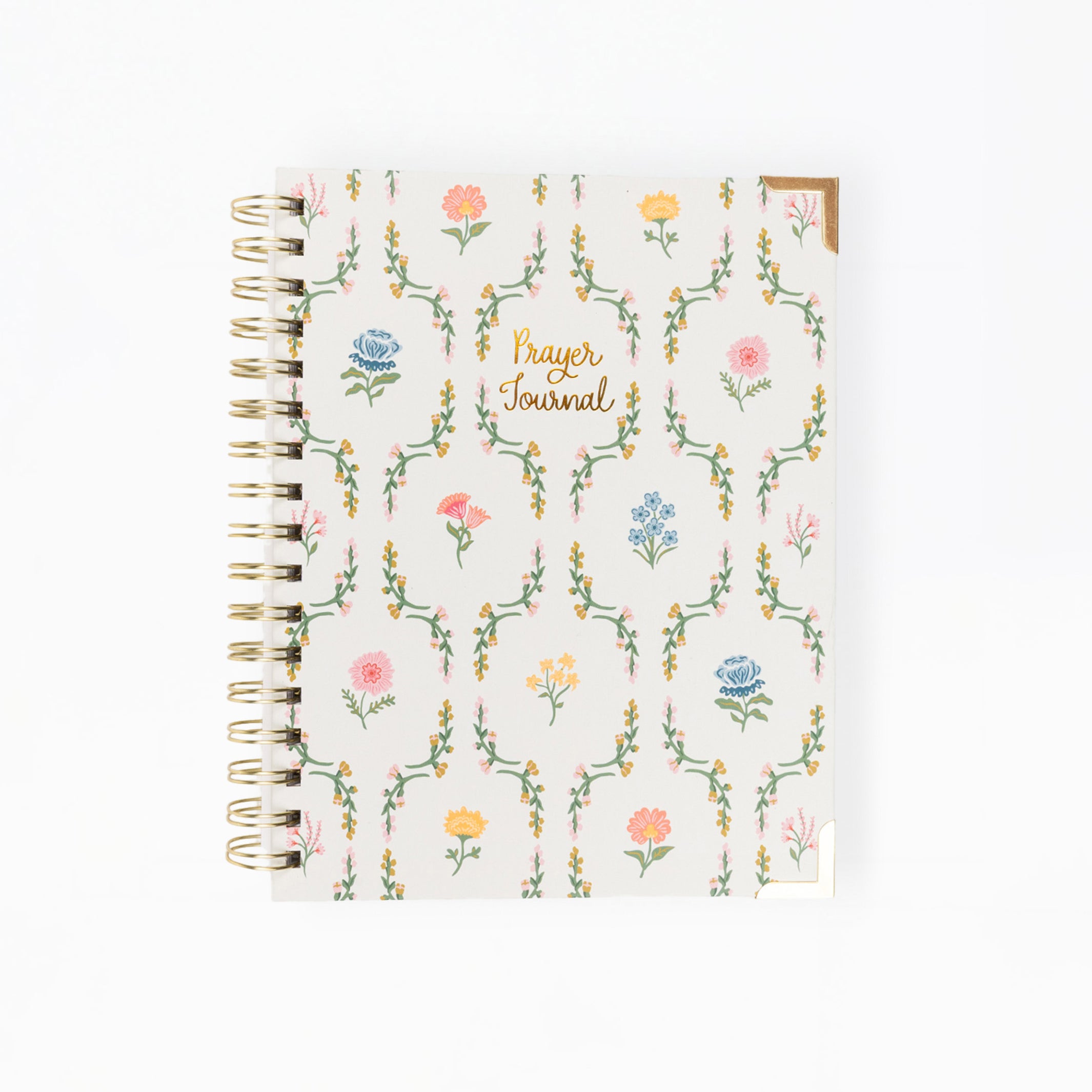 A spiral-bound prayer journal with a cream-colored cover decorated with a delicate multicolor floral and vine pattern, featuring gold foil lettering that reads 'Prayer Journal'.
