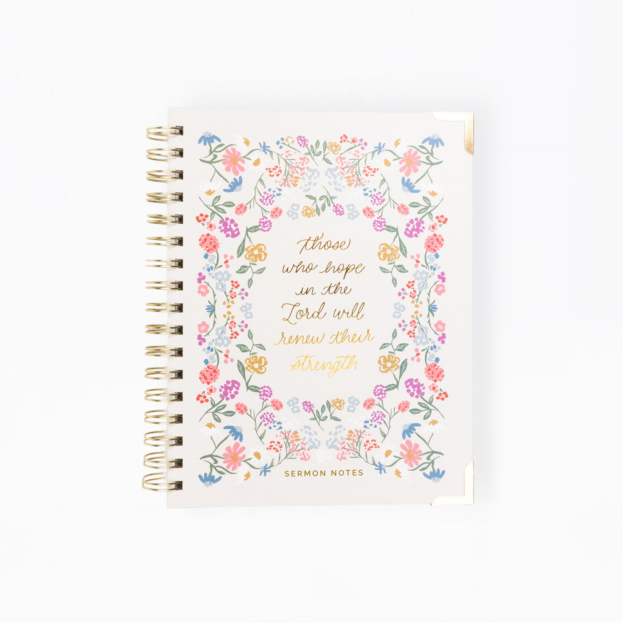 A spiral-bound lemon note journal featuring a colorful floral border and gold foil text on the cover, set against a plain white background.