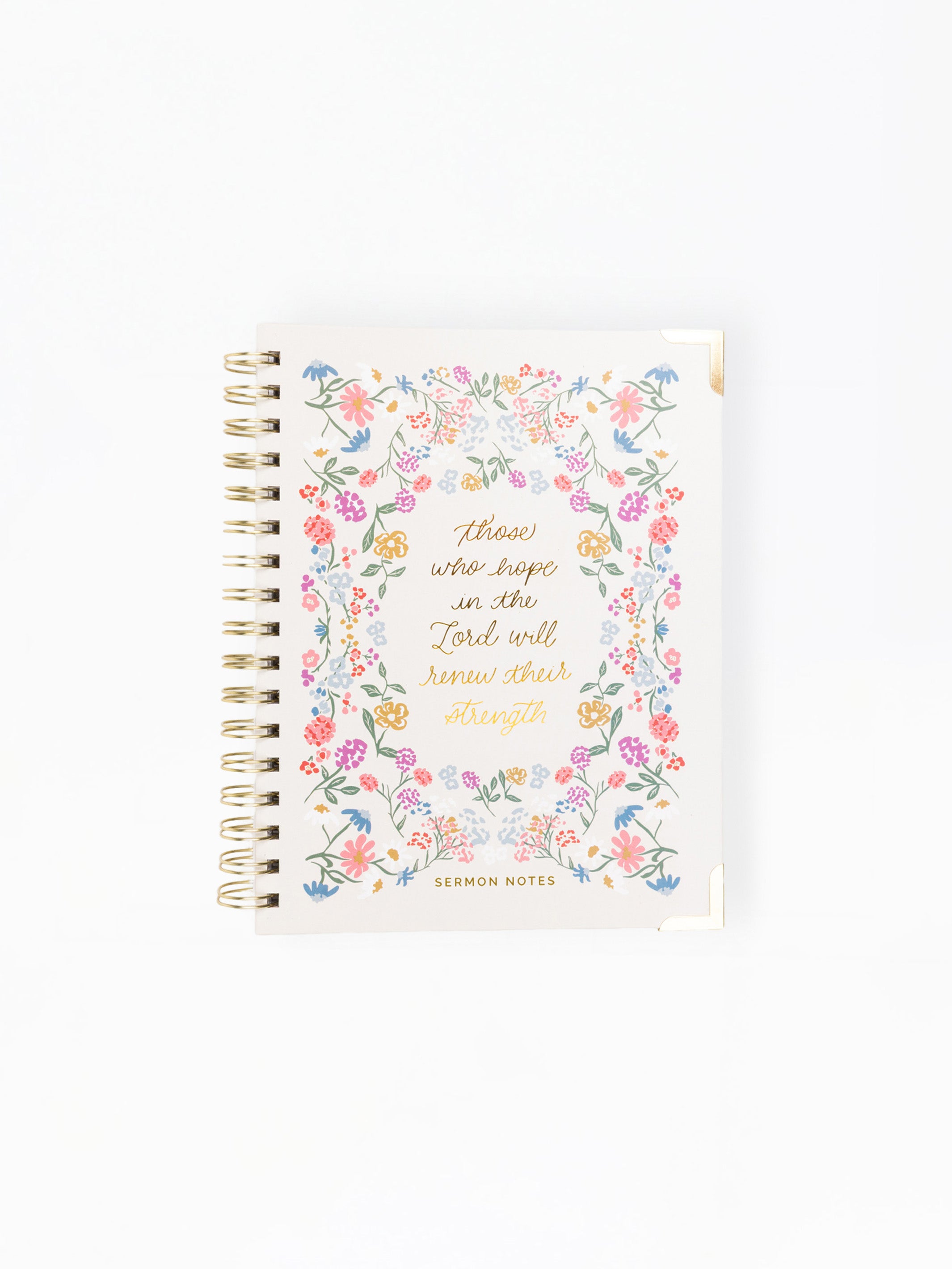 A spiral-bound lemon note journal featuring a colorful floral border and gold foil text on the cover, set against a plain white background.